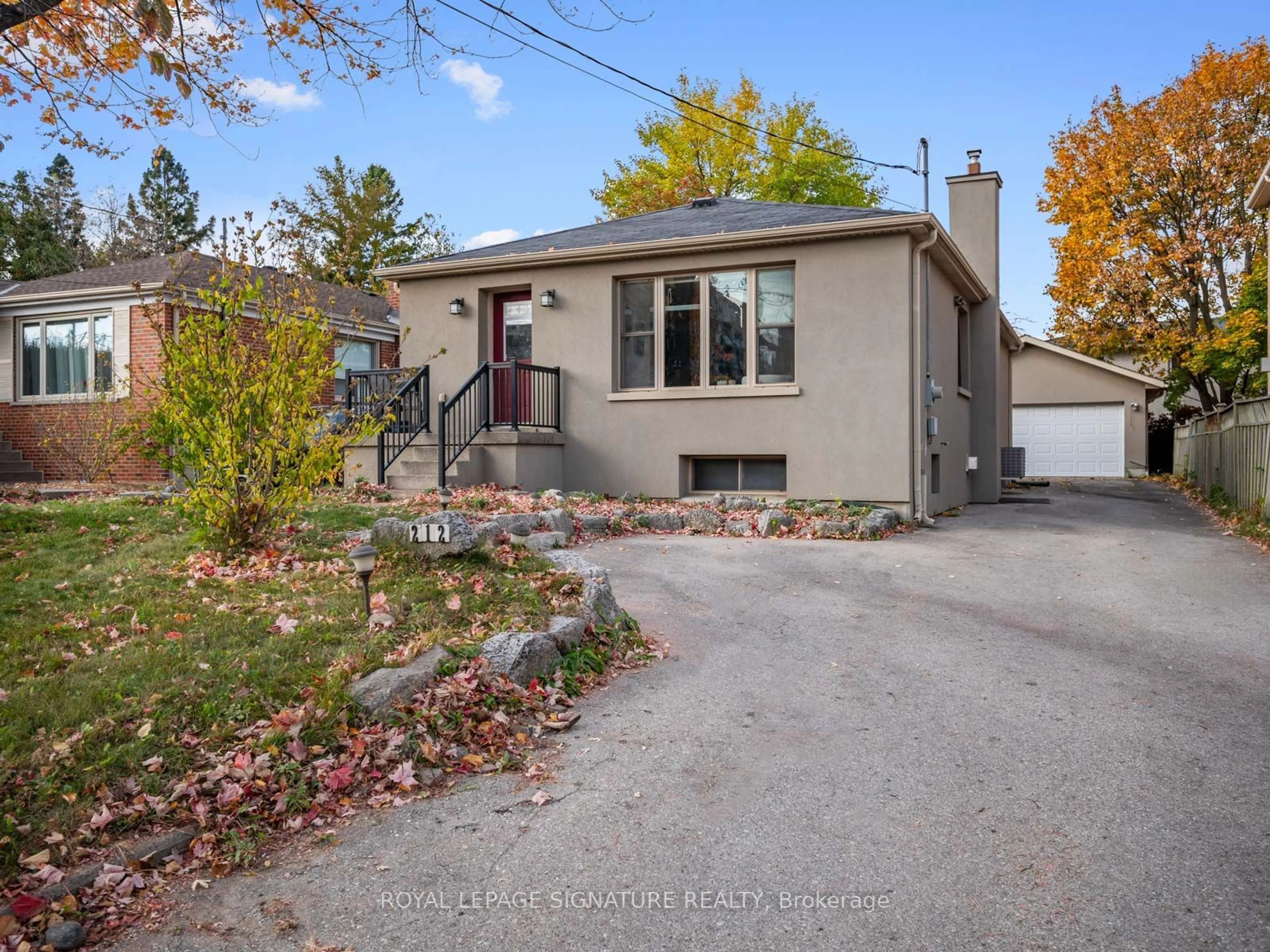 Frontside or backside of a home, the street view for 212 Cocksfield Ave, Toronto Ontario M3H 3T7