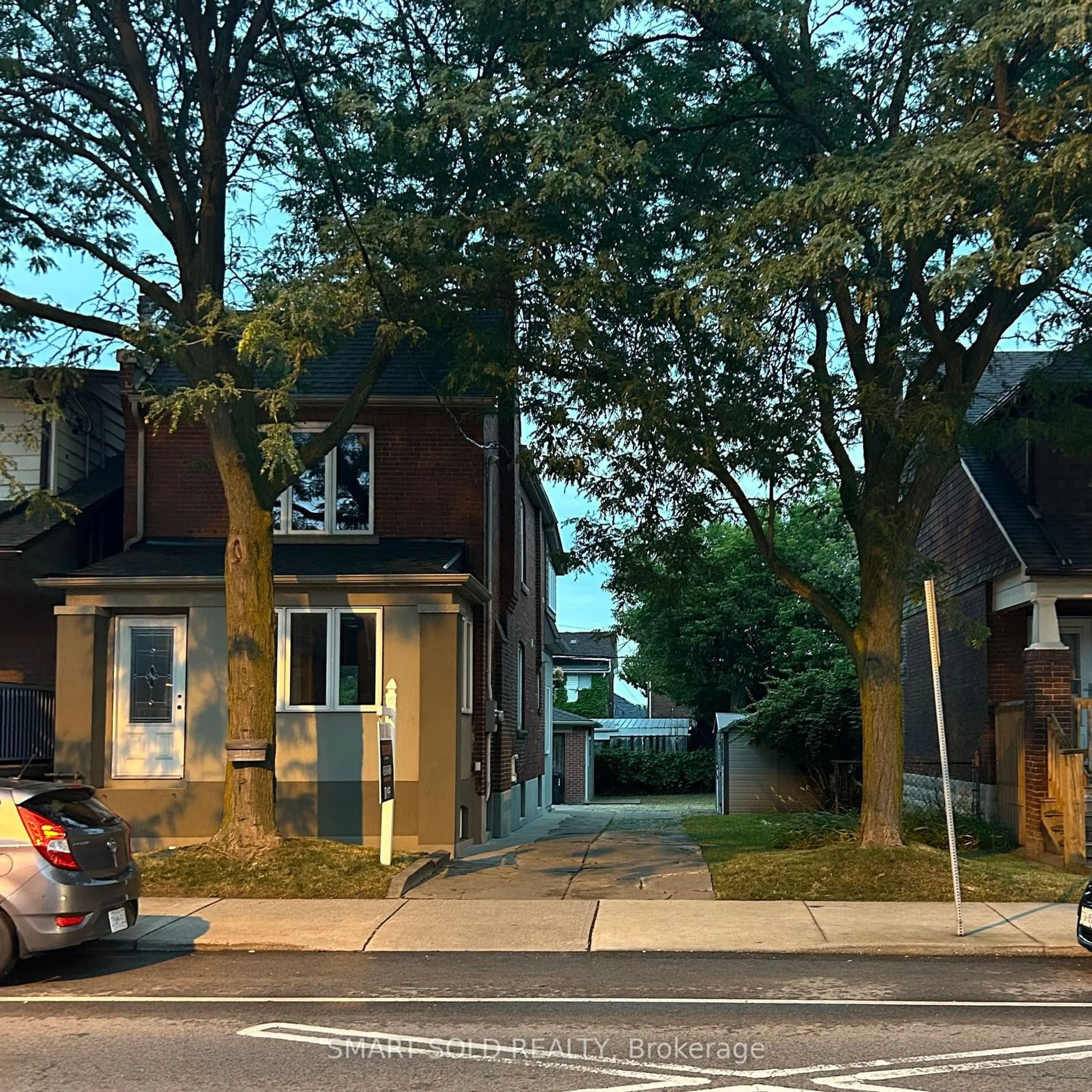 Frontside or backside of a home, the street view for 295 Oakwood Ave, Toronto Ontario M6E 2V3