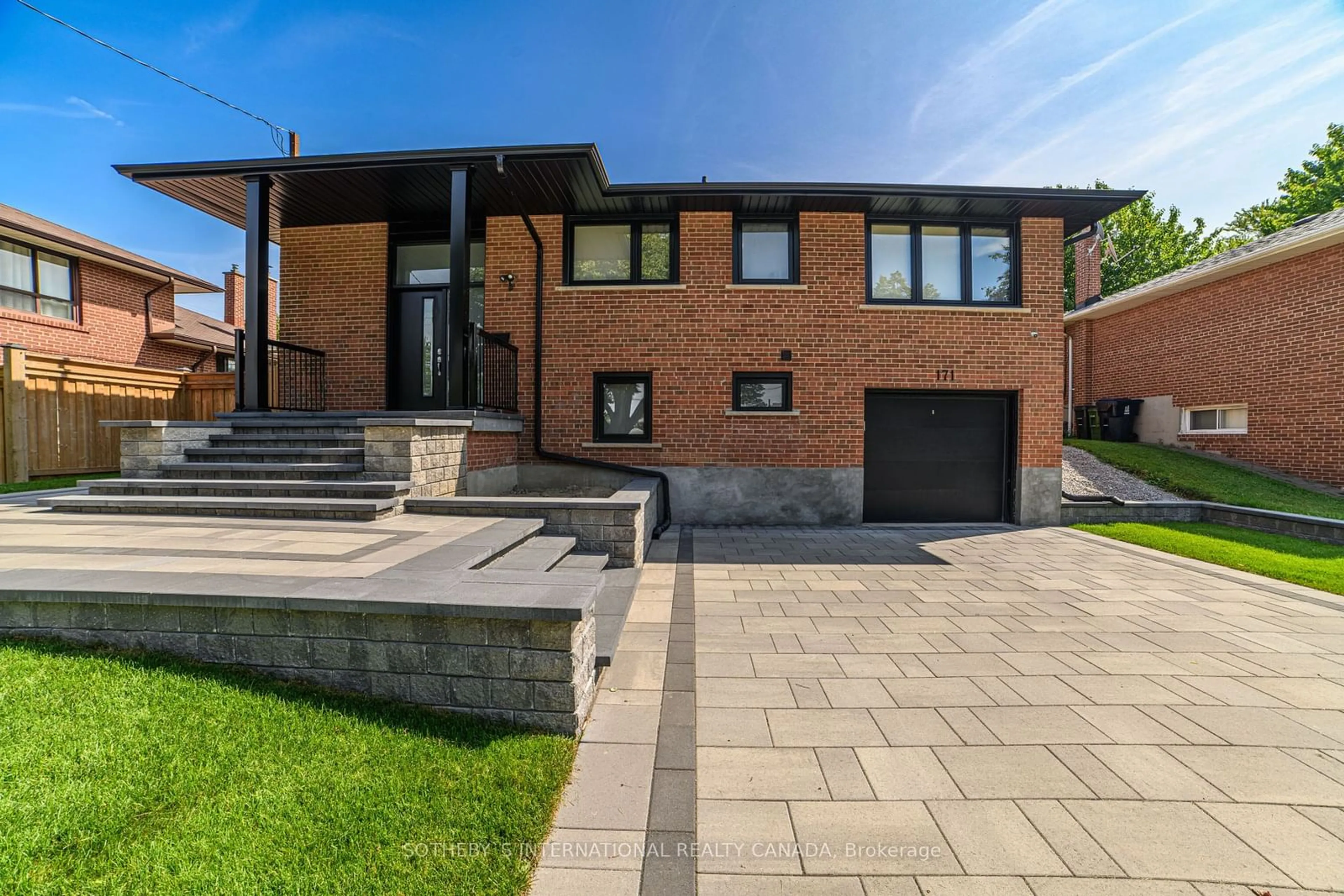 Home with brick exterior material for 171 Sloane Ave, Toronto Ontario M4A 2C2