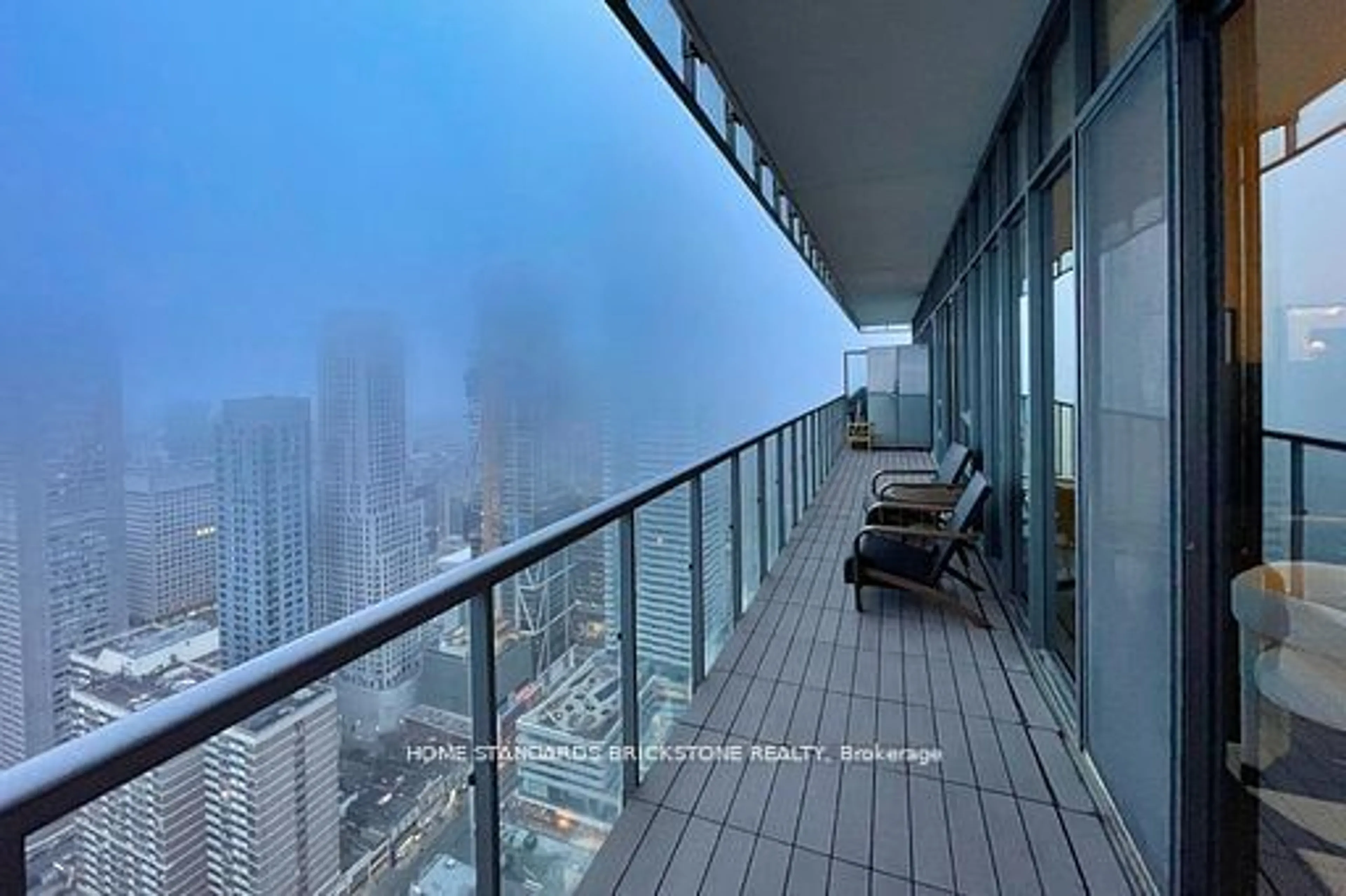 Balcony in the apartment, the view of city buildings for 33 Charles St #4404, Toronto Ontario M4Y 0A2