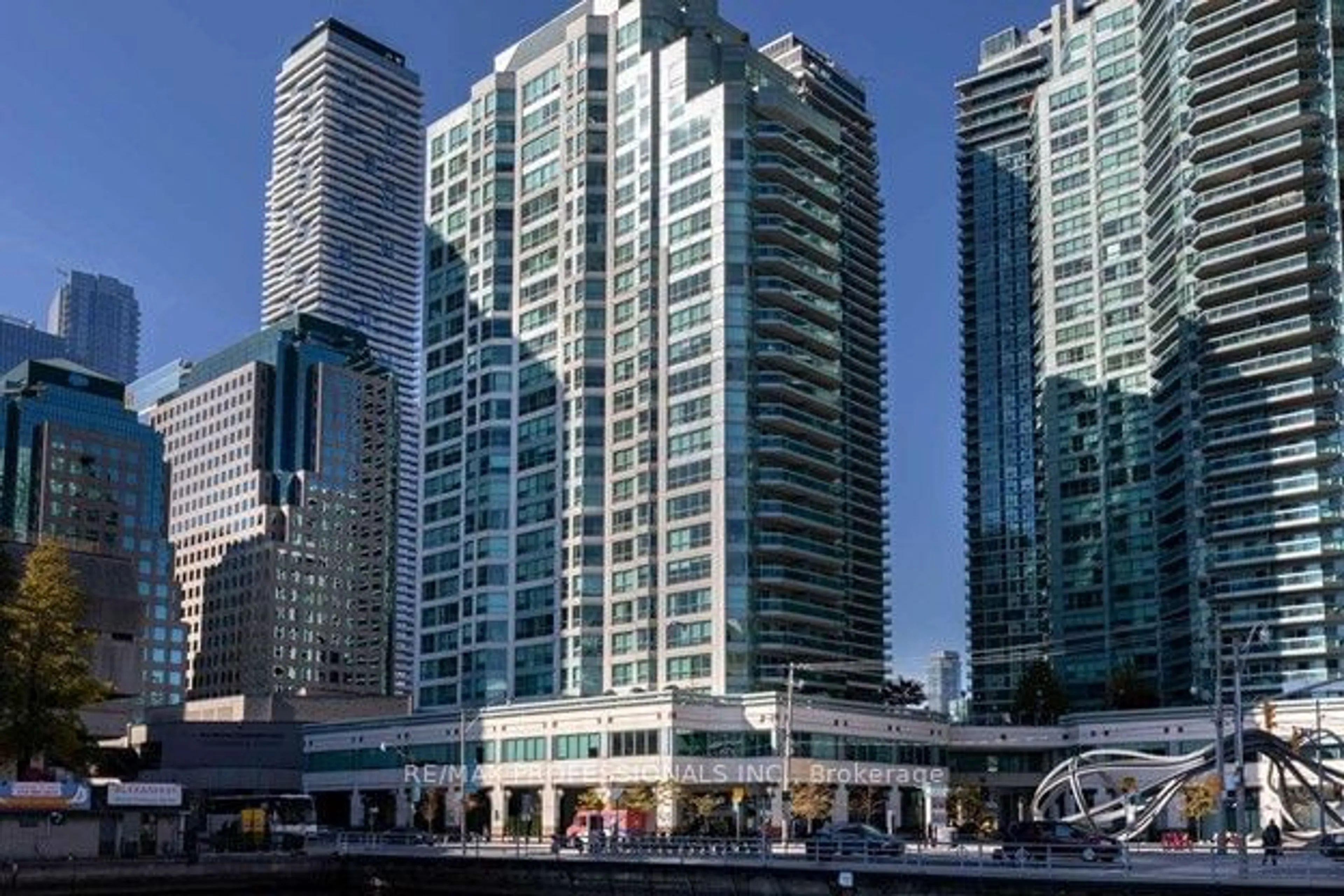 A pic from exterior of the house or condo, the view of city buildings for 10 Queens Quay #1808, Toronto Ontario M5J 2R9