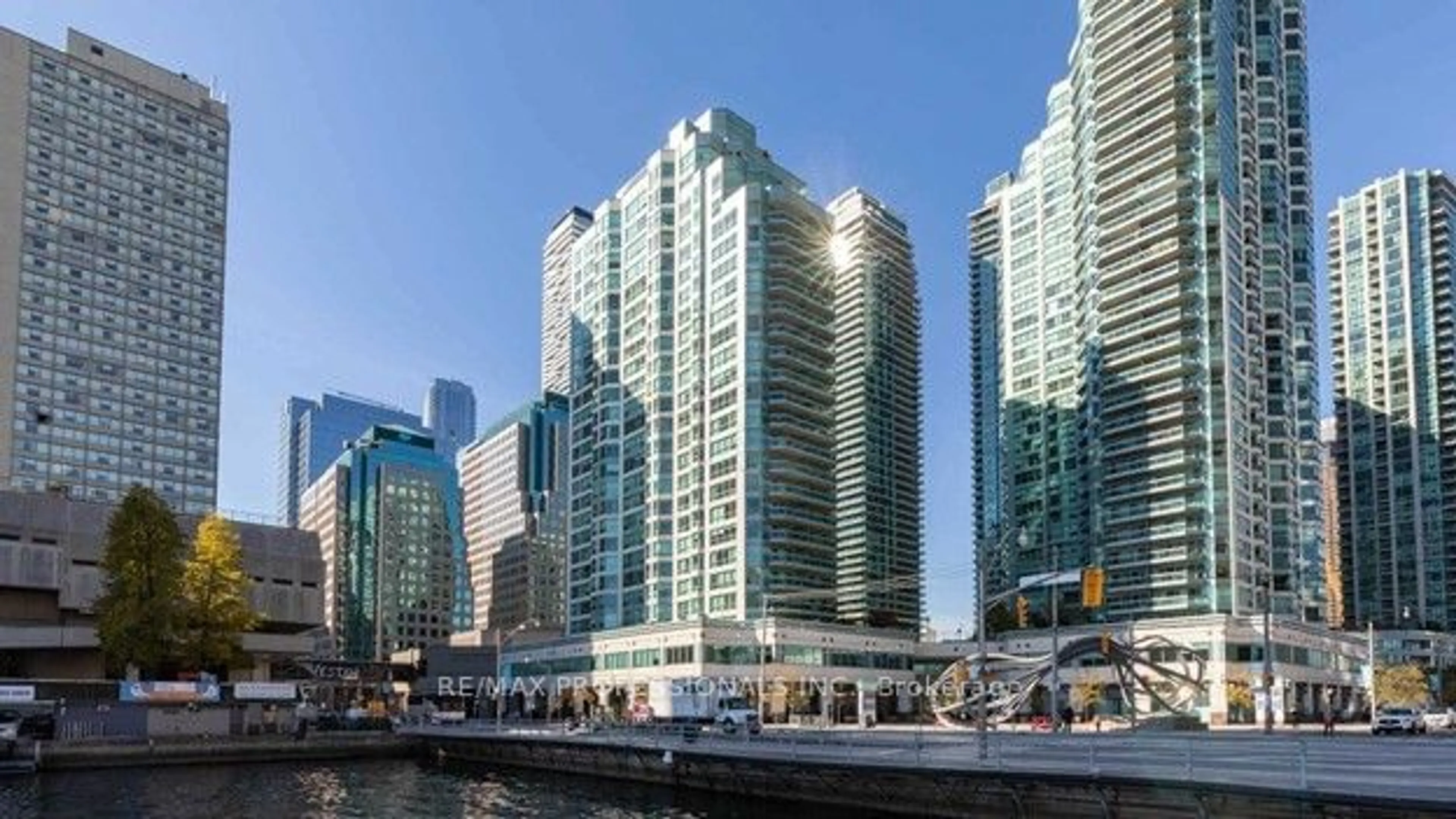 A pic from exterior of the house or condo, the view of city buildings for 10 Queens Quay #1808, Toronto Ontario M5J 2R9