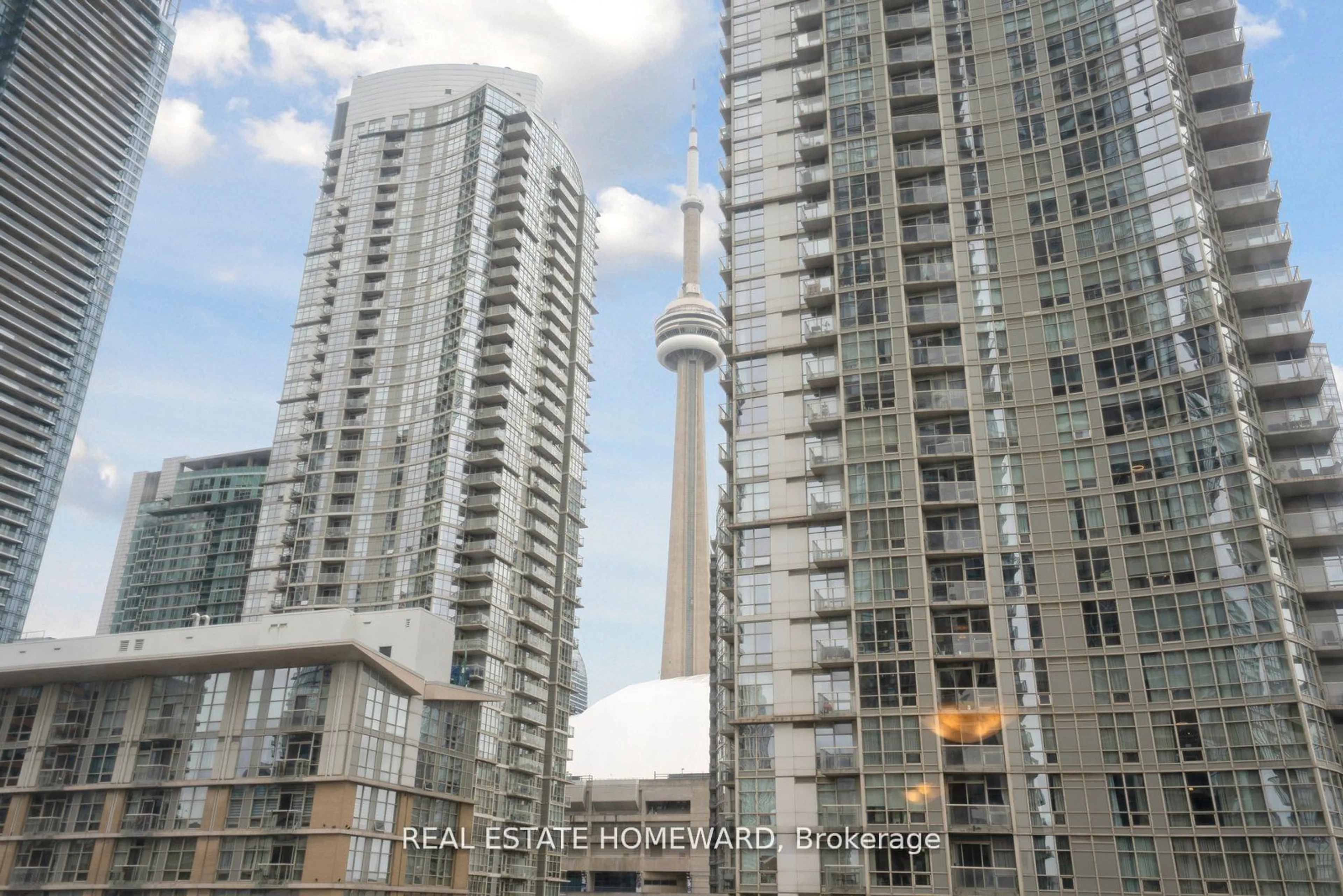 A pic from exterior of the house or condo, the view of city buildings for 11 Brunel Crt #509, Toronto Ontario M5V 3Y3