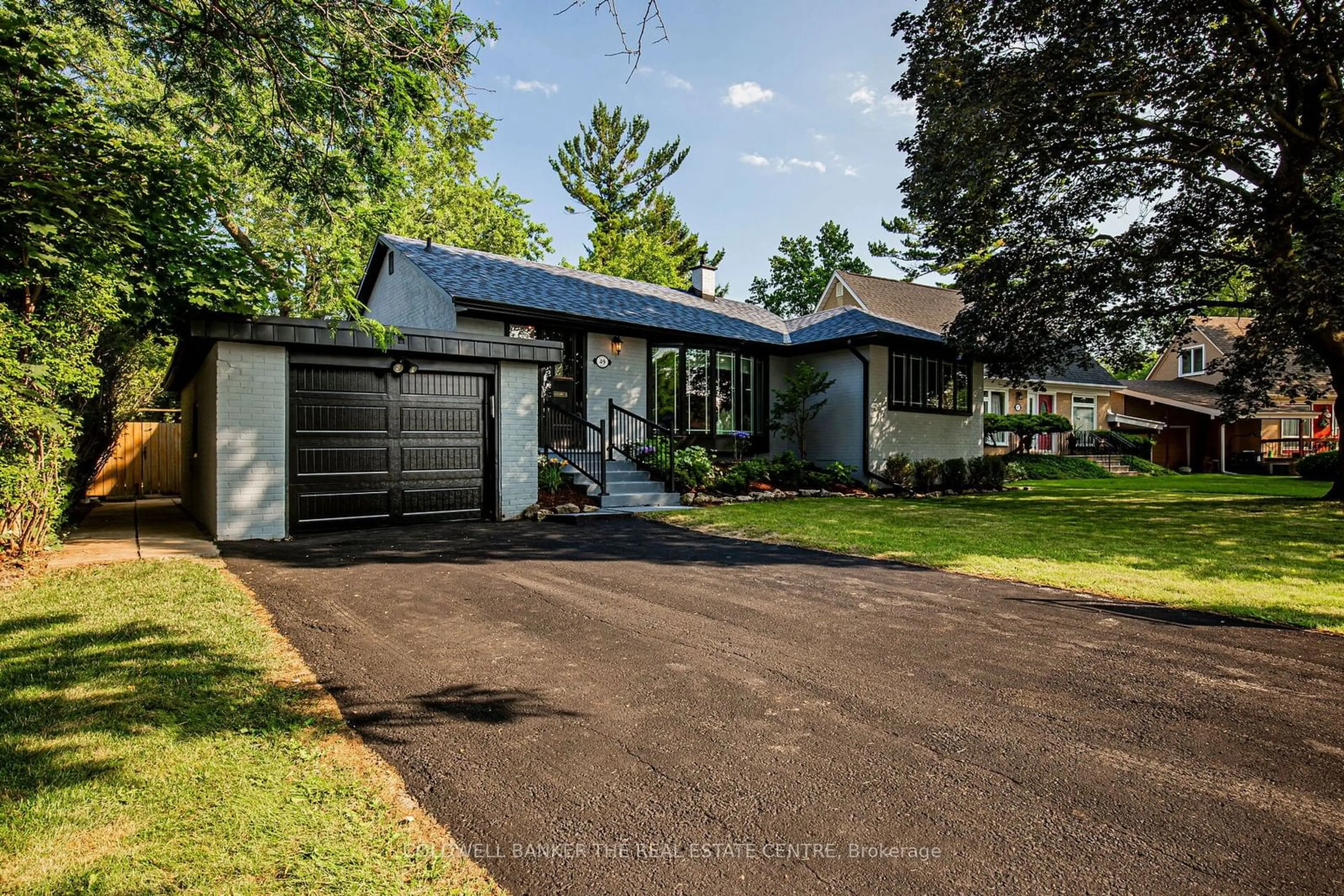 Home with vinyl exterior material for 49 Mallow Rd, Toronto Ontario M3B 1G2