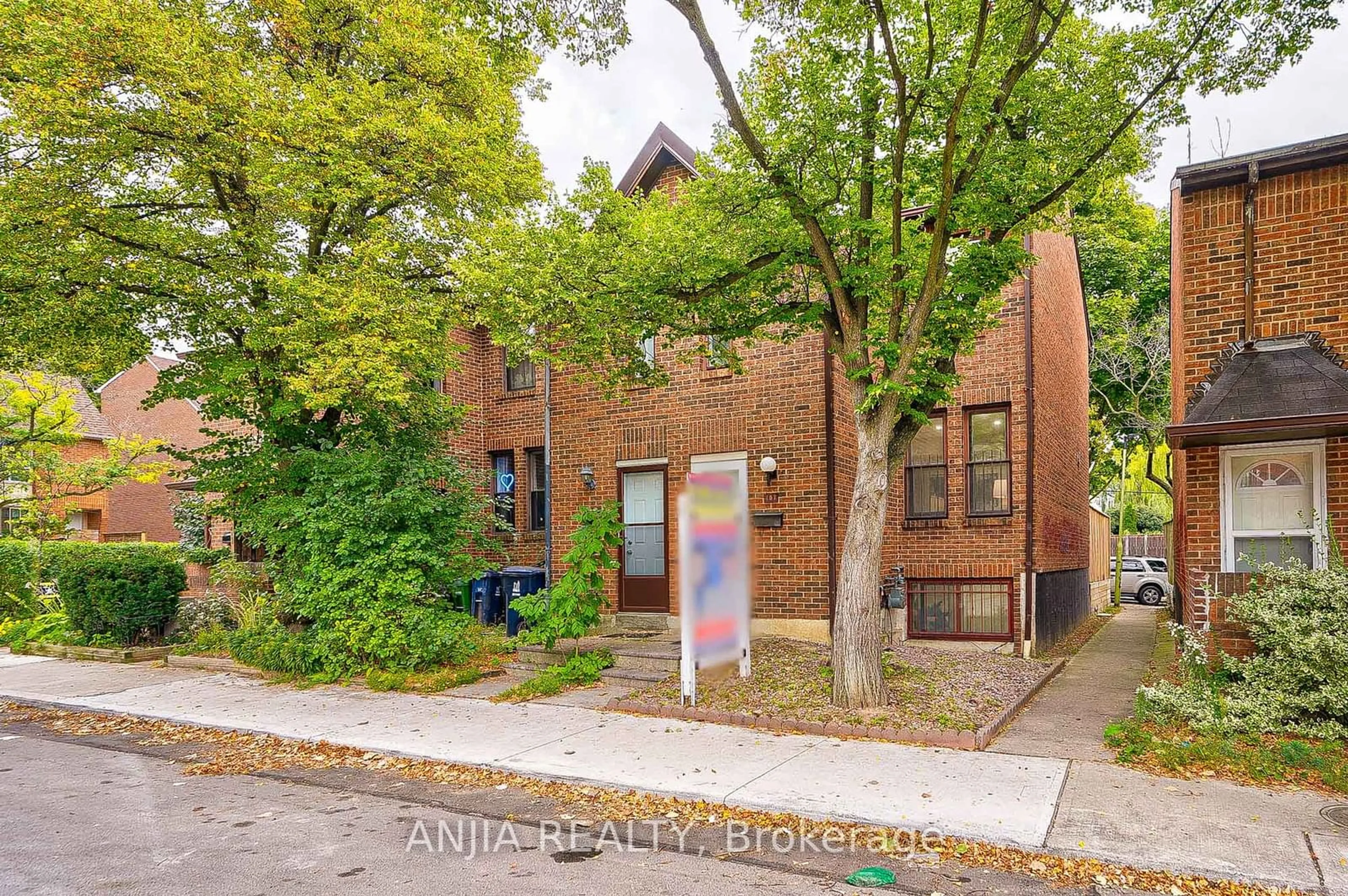 A pic from exterior of the house or condo, the street view for 407 Melita Cres, Toronto Ontario M6G 3X2