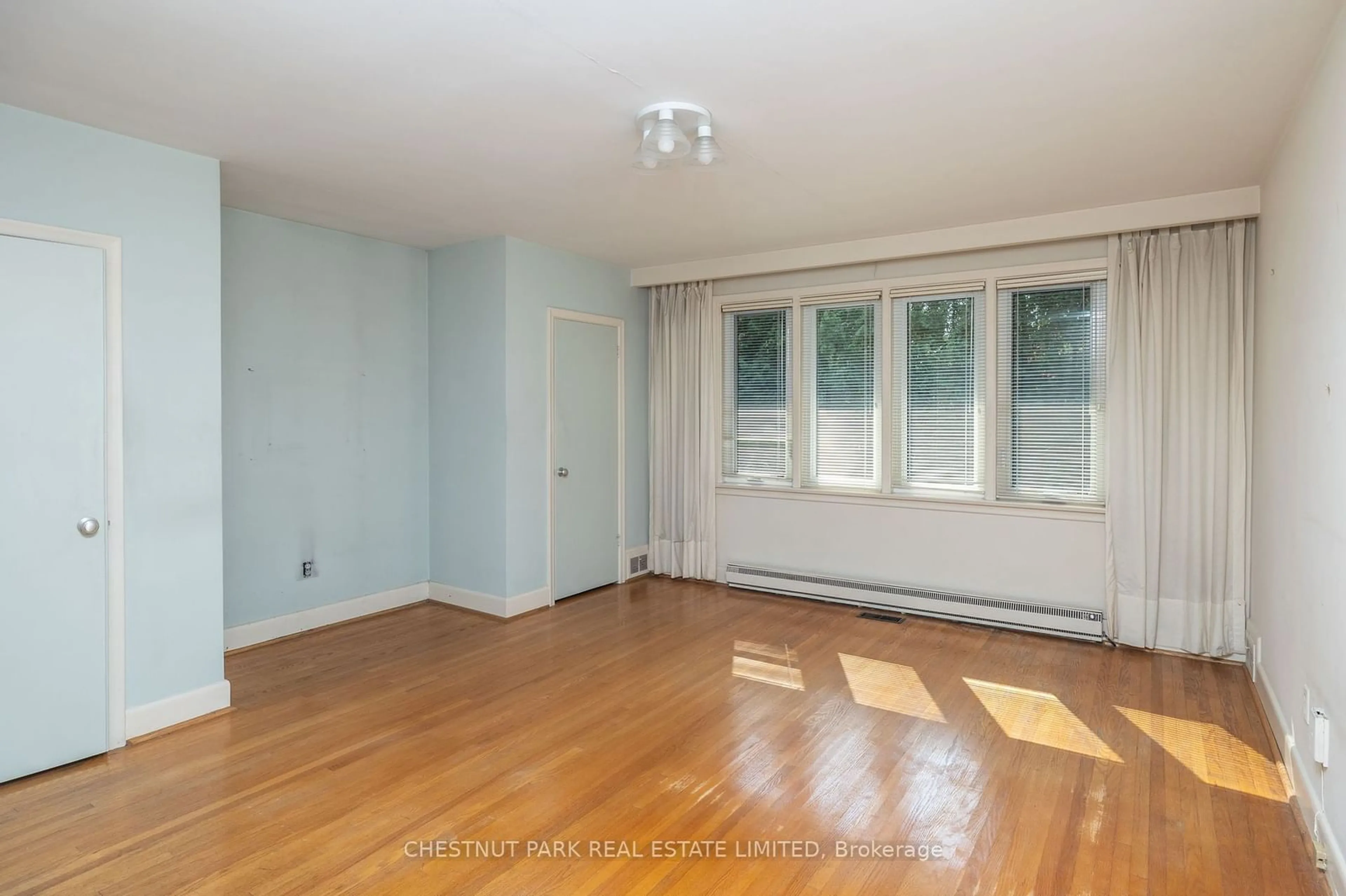 A pic of a room, wood floors for 14 Rollscourt Dr, Toronto Ontario M2L 1X5