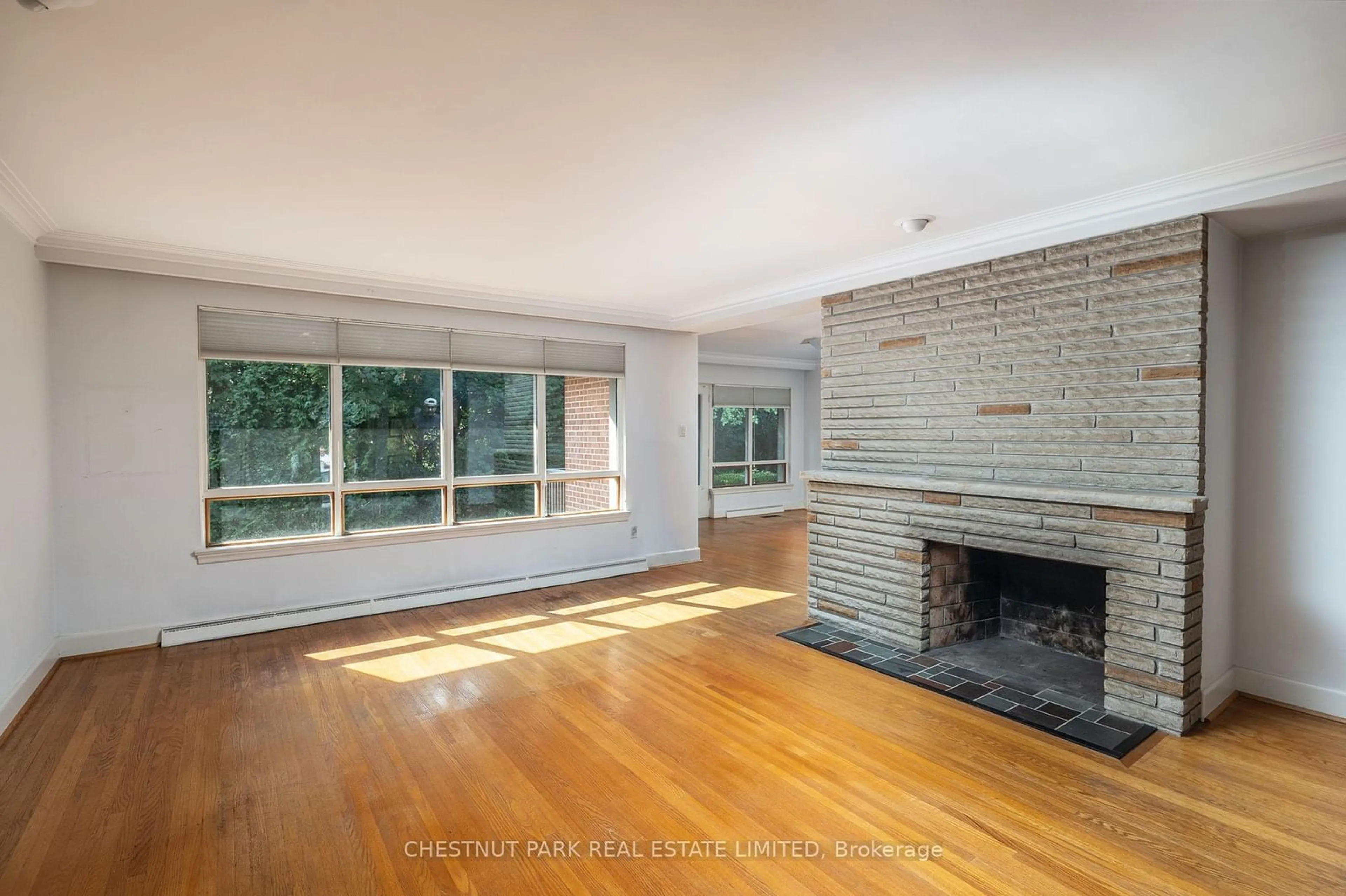 A pic of a room, wood floors for 14 Rollscourt Dr, Toronto Ontario M2L 1X5