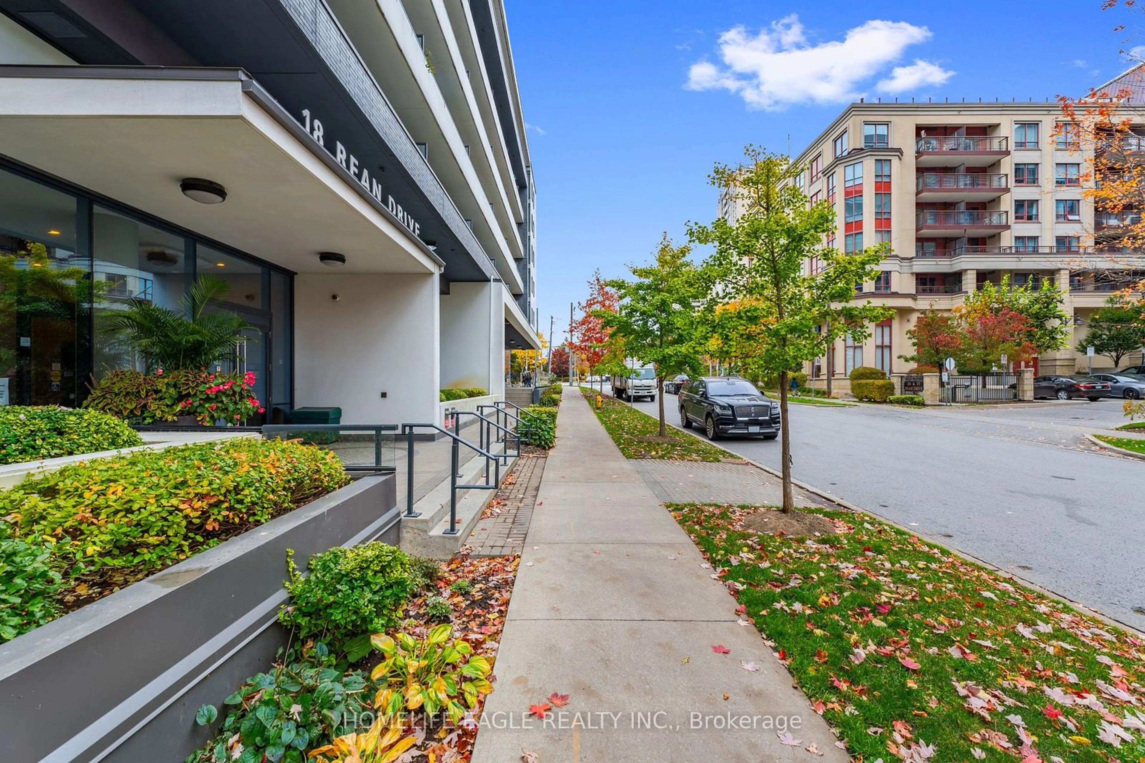 A pic from exterior of the house or condo, the street view for 18 Rean Dr #222, Toronto Ontario M2K 0C7