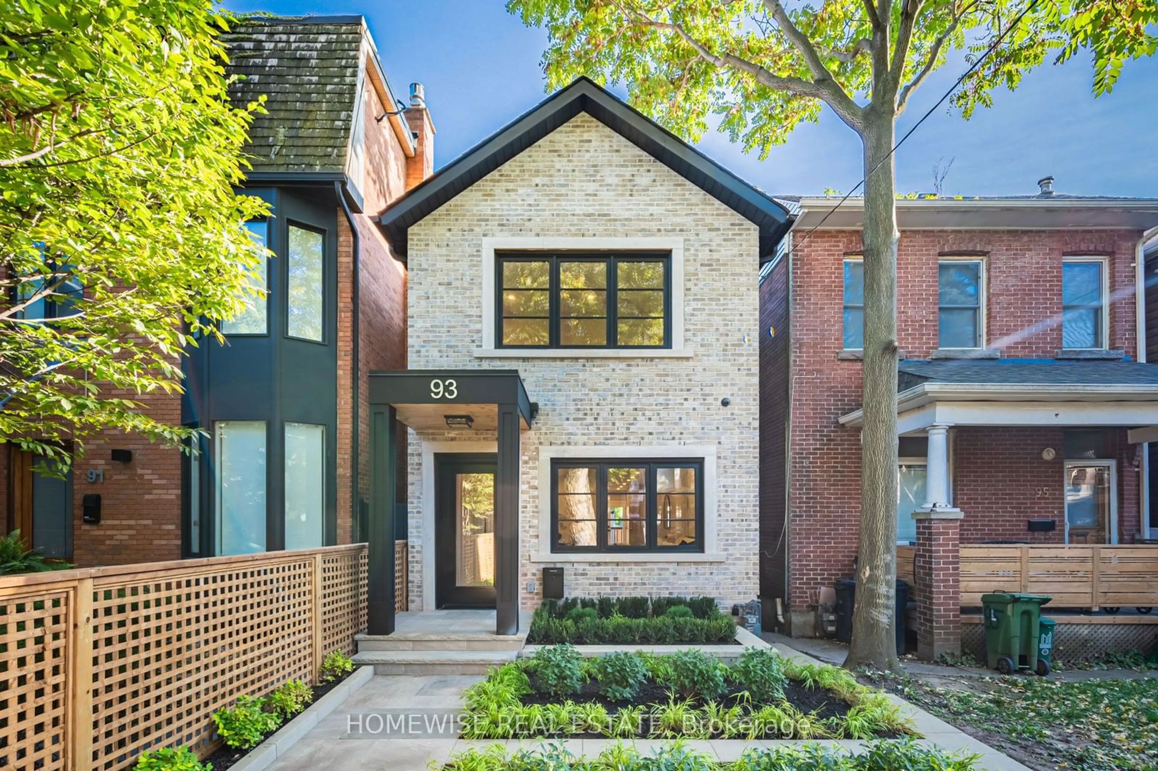 Home with brick exterior material for 93 Helena Ave, Toronto Ontario M6G 2H3