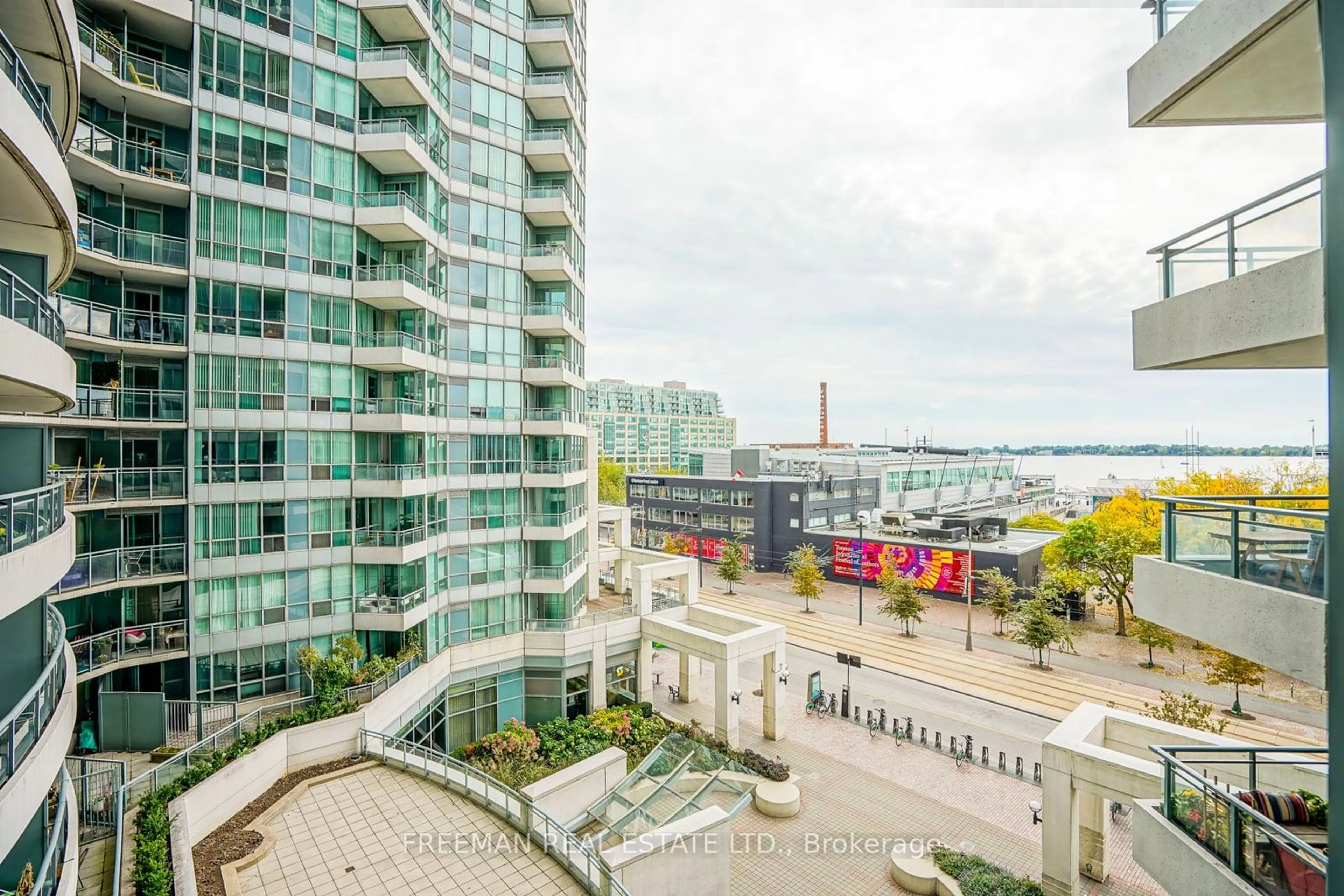 A pic from exterior of the house or condo, the view of city buildings for 230 Queen Quay #620, Toronto Ontario M5J 2Y7