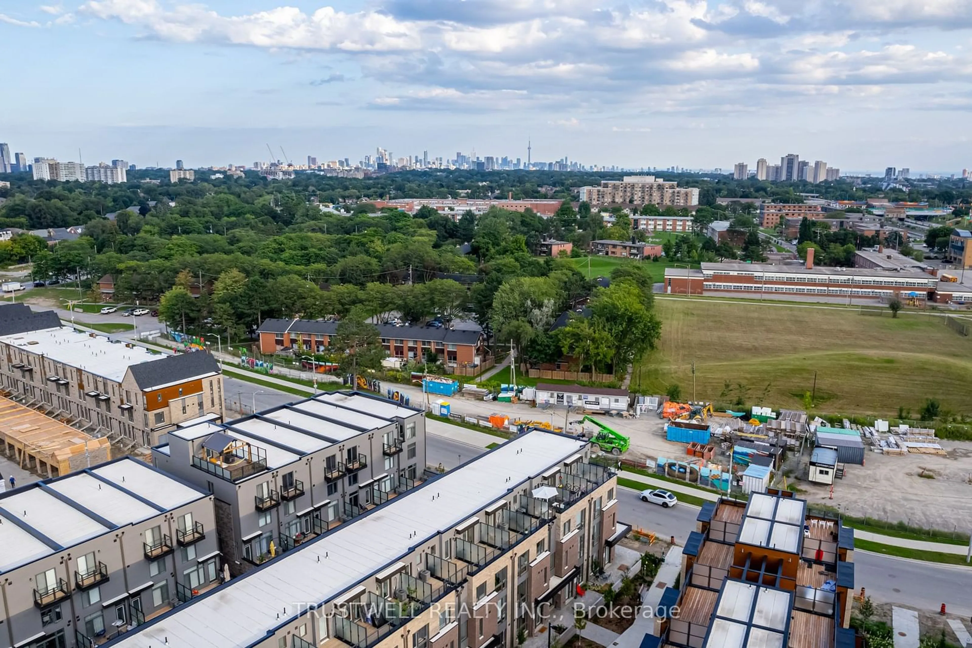 A pic from exterior of the house or condo, the view of city buildings for 88 Turtle Island Rd #13, Toronto Ontario M6A 0E4