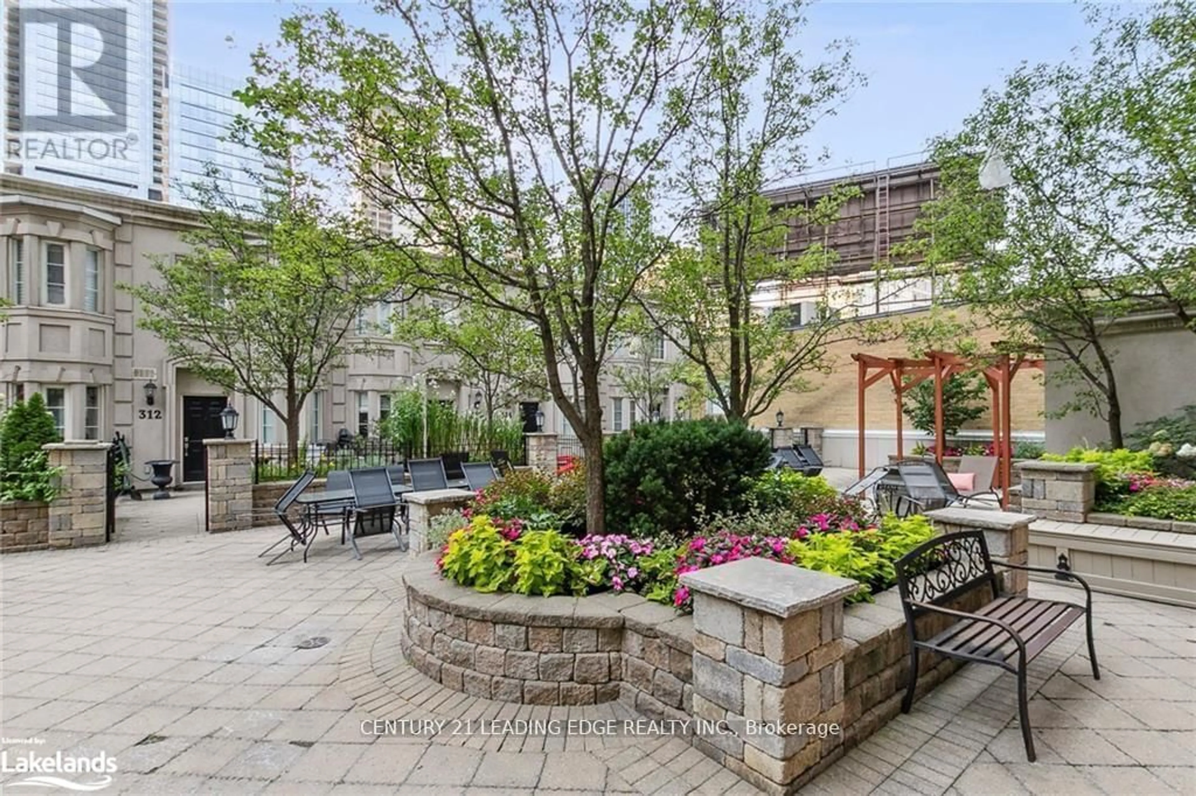 Patio, the fenced backyard for 840 Church St #6 & 7, Toronto Ontario M4W 3Y5