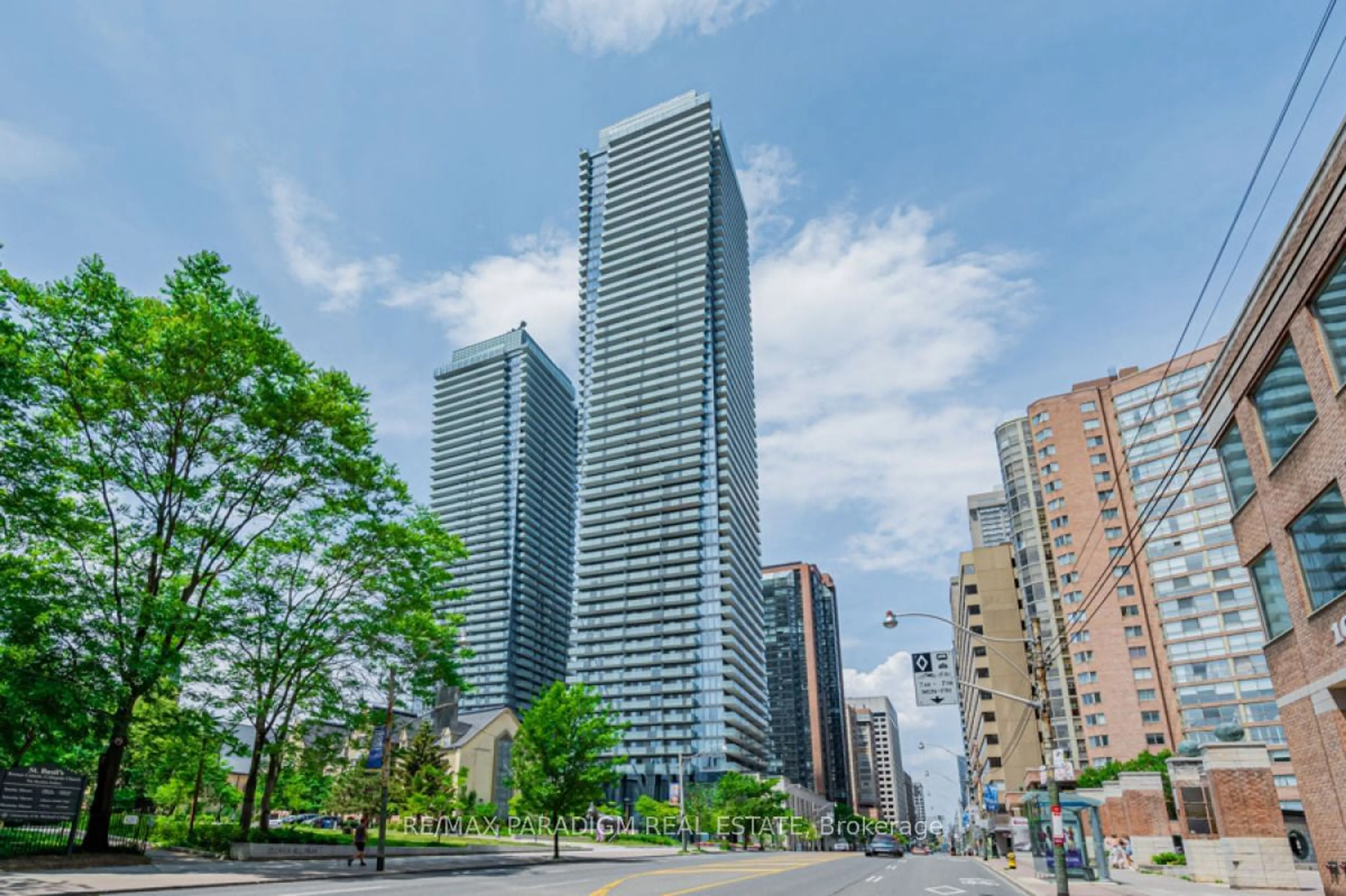 A pic from exterior of the house or condo, the view of city buildings for 65 St Mary St #Lph 03, Toronto Ontario M5S 0A6