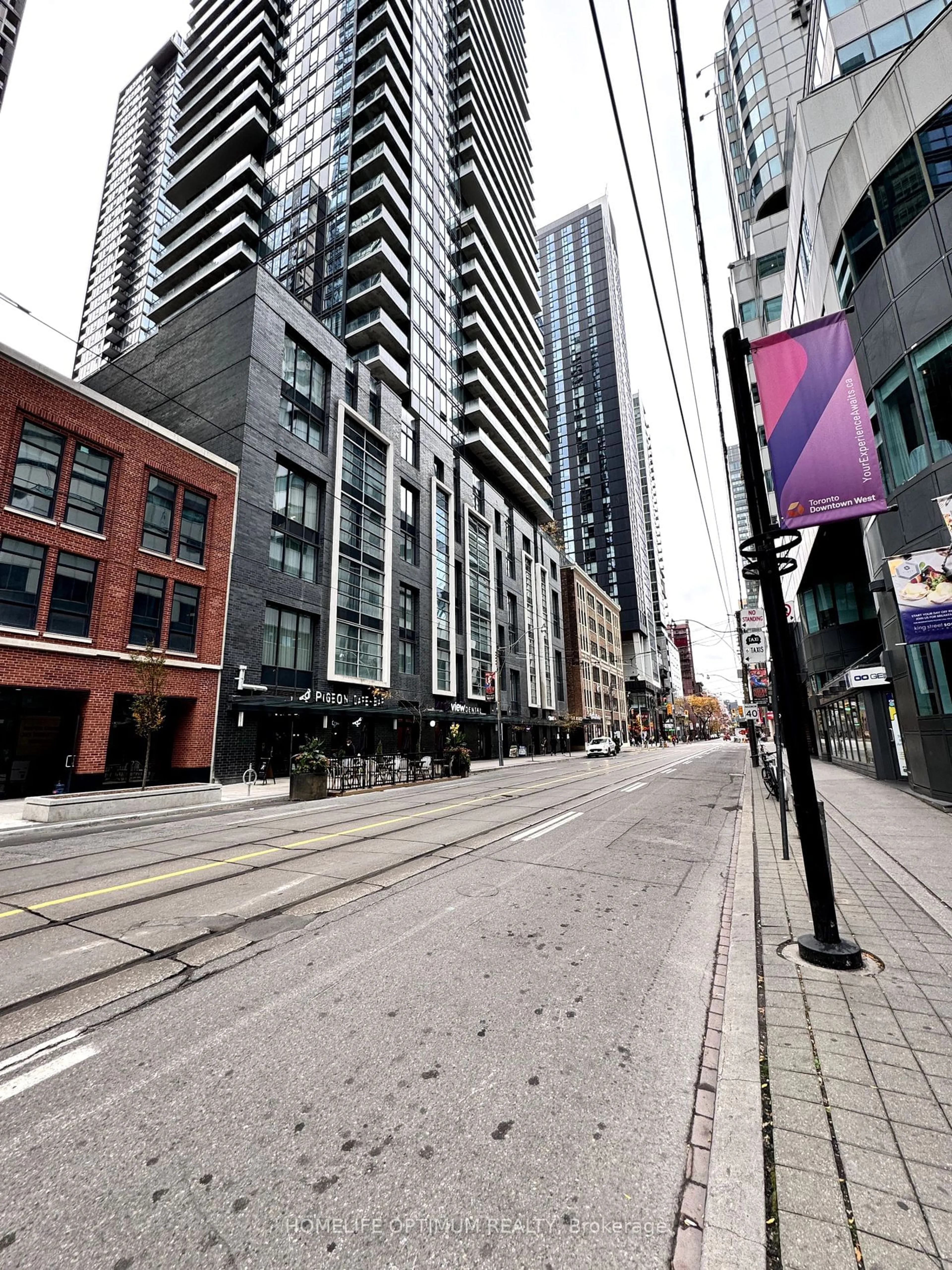 A pic from exterior of the house or condo, the street view for 327 King St #2301, Toronto Ontario M5V 0W7