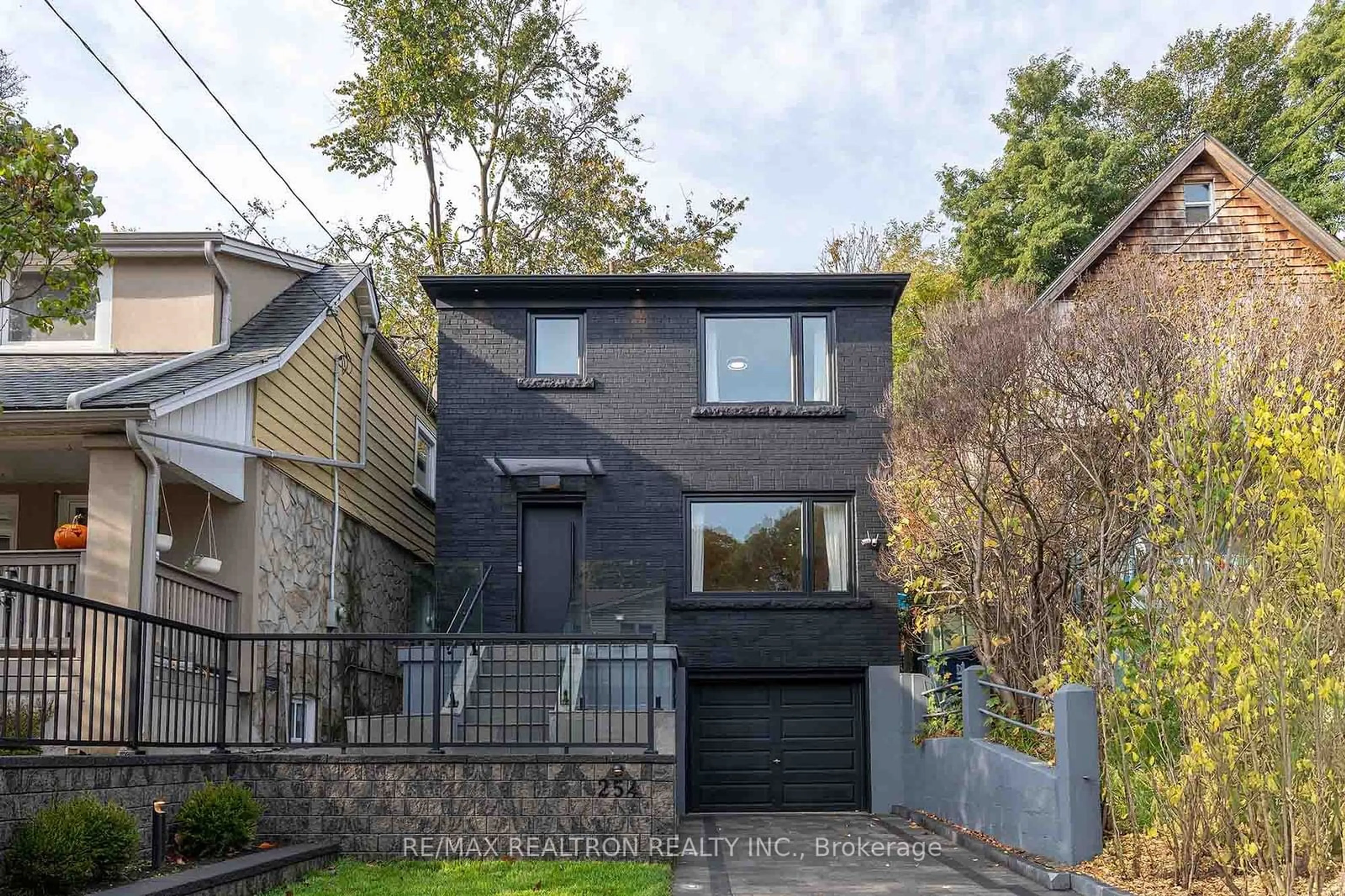 Frontside or backside of a home, cottage for 254 Hastings Ave, Toronto Ontario M4L 2M1