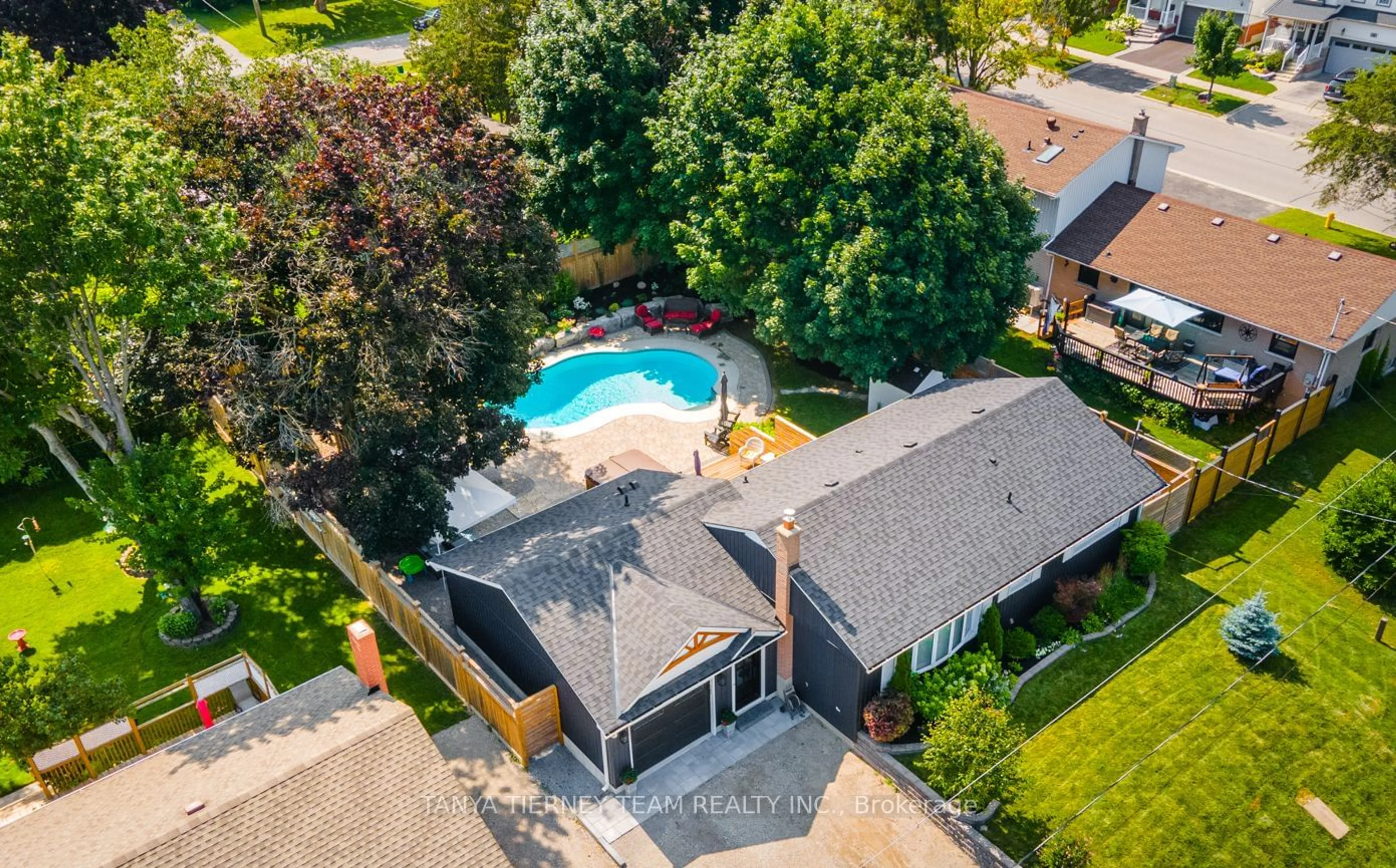 Frontside or backside of a home, the fenced backyard for 54 Mitchell Ave, Whitby Ontario L1M 1A9