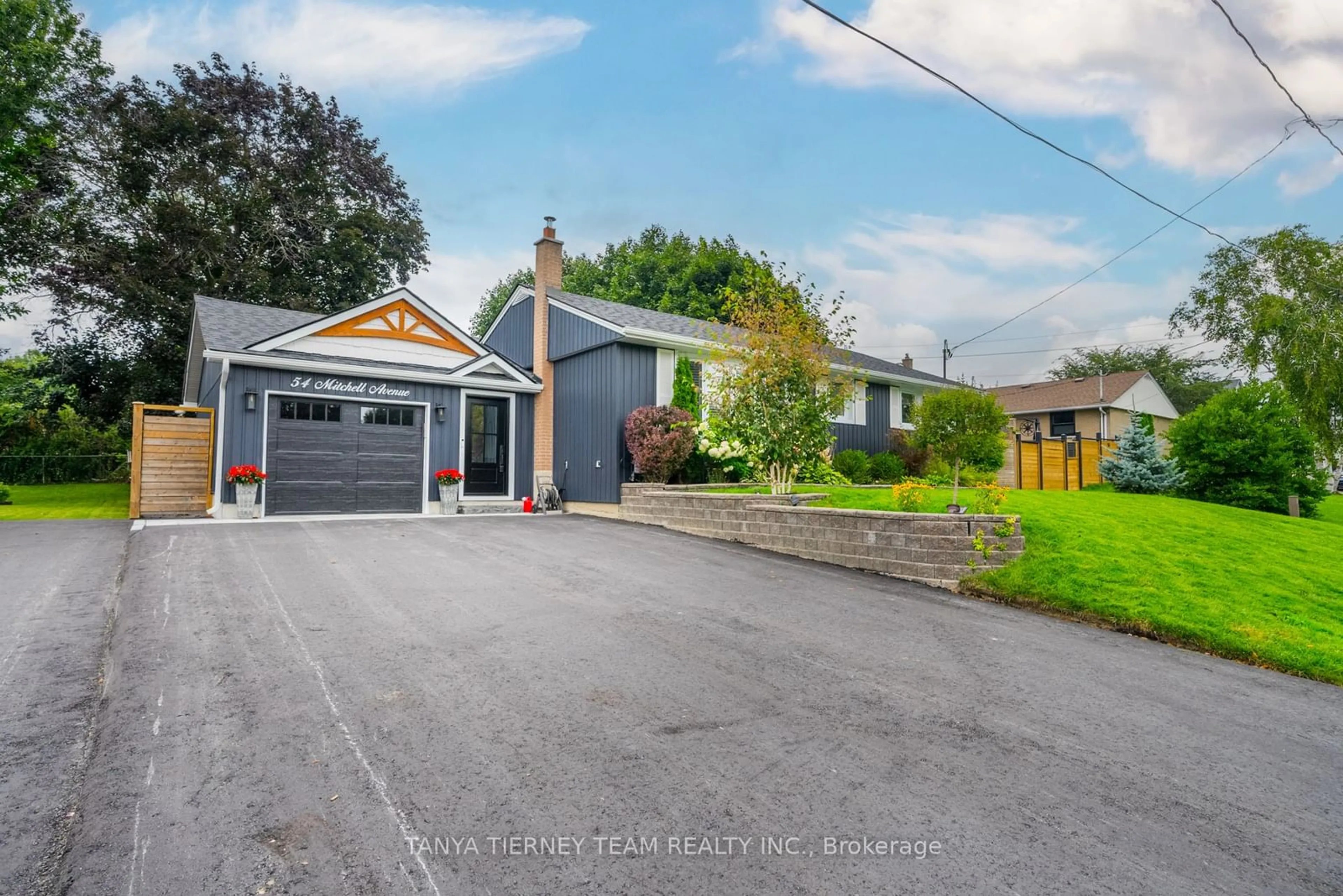 Frontside or backside of a home, the street view for 54 Mitchell Ave, Whitby Ontario L1M 1A9