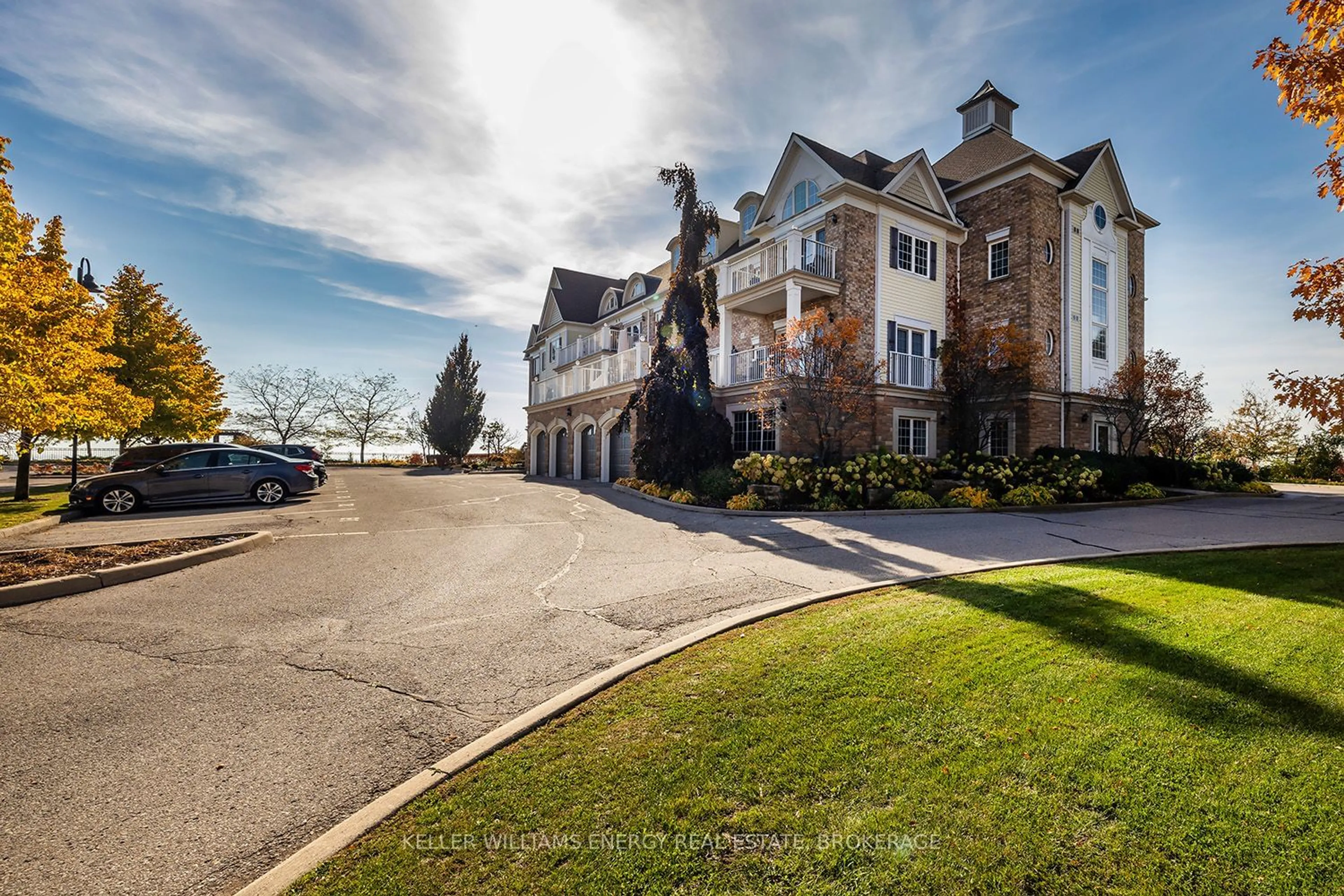 A pic from exterior of the house or condo, the street view for 395 Lakebreeze Dr #202, Clarington Ontario L1B 0A5