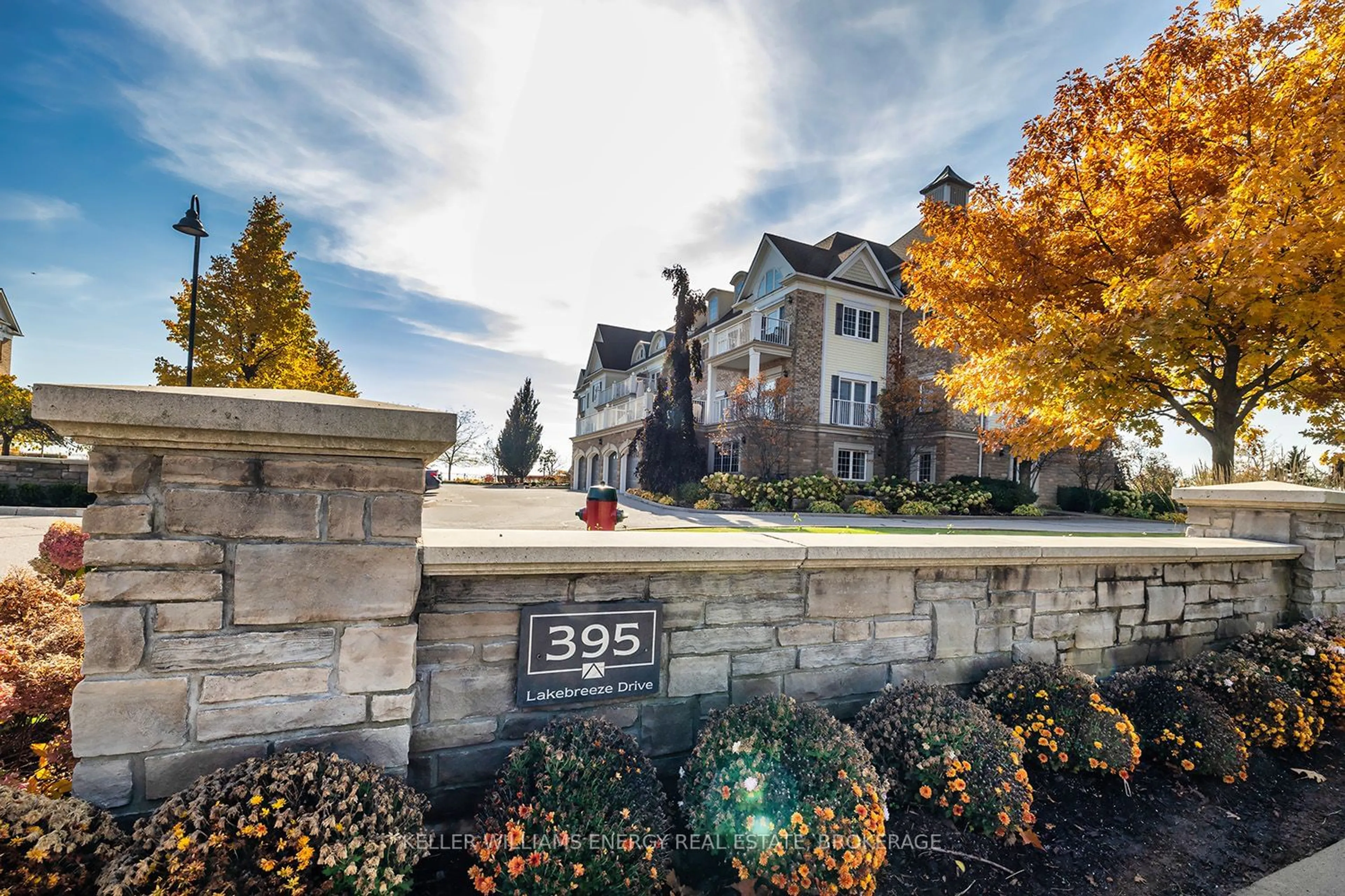 A pic from exterior of the house or condo, the street view for 395 Lakebreeze Dr #202, Clarington Ontario L1B 0A5