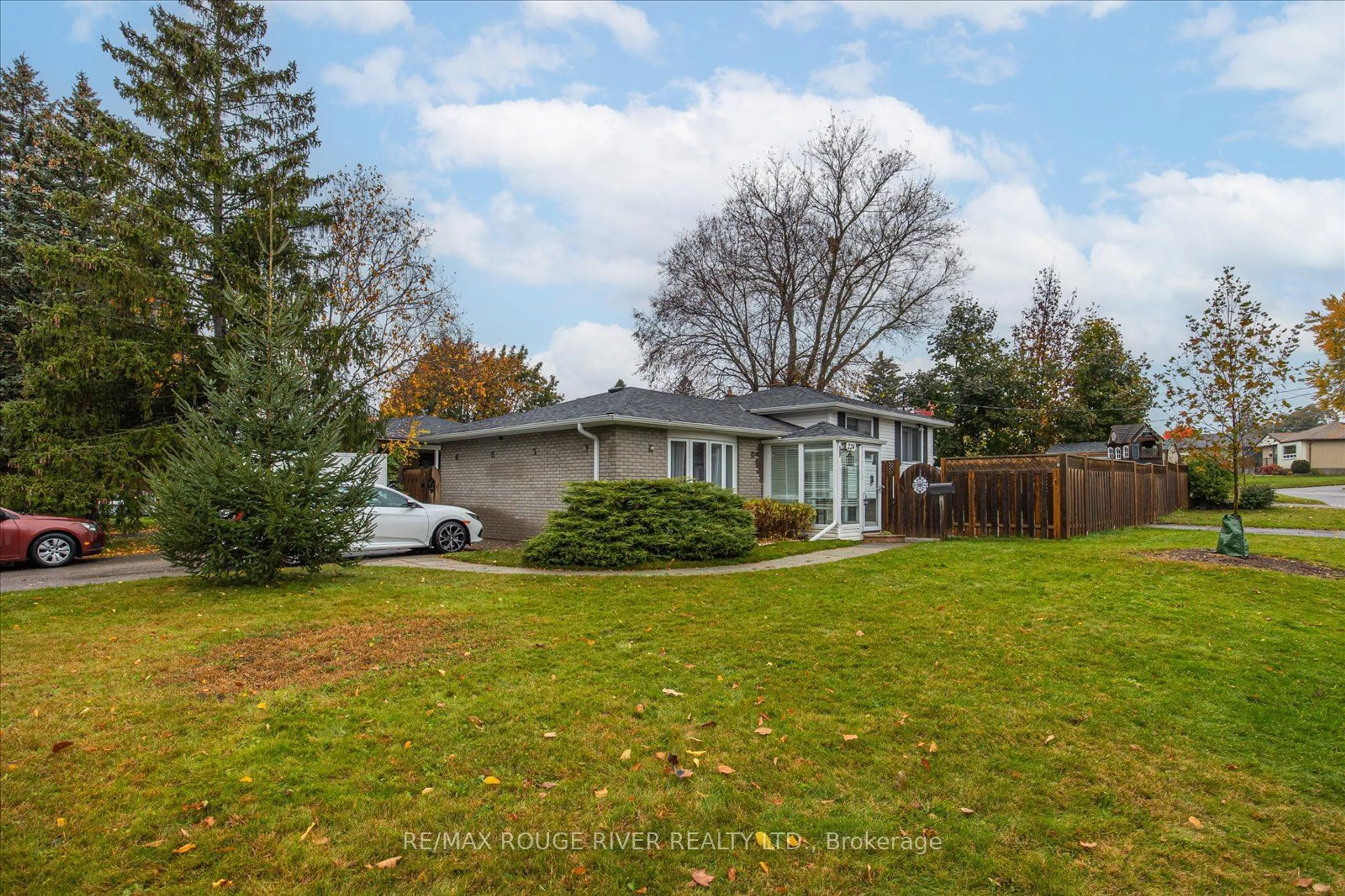 Frontside or backside of a home, the fenced backyard for 224 Arden Dr, Oshawa Ontario L1G 1X5