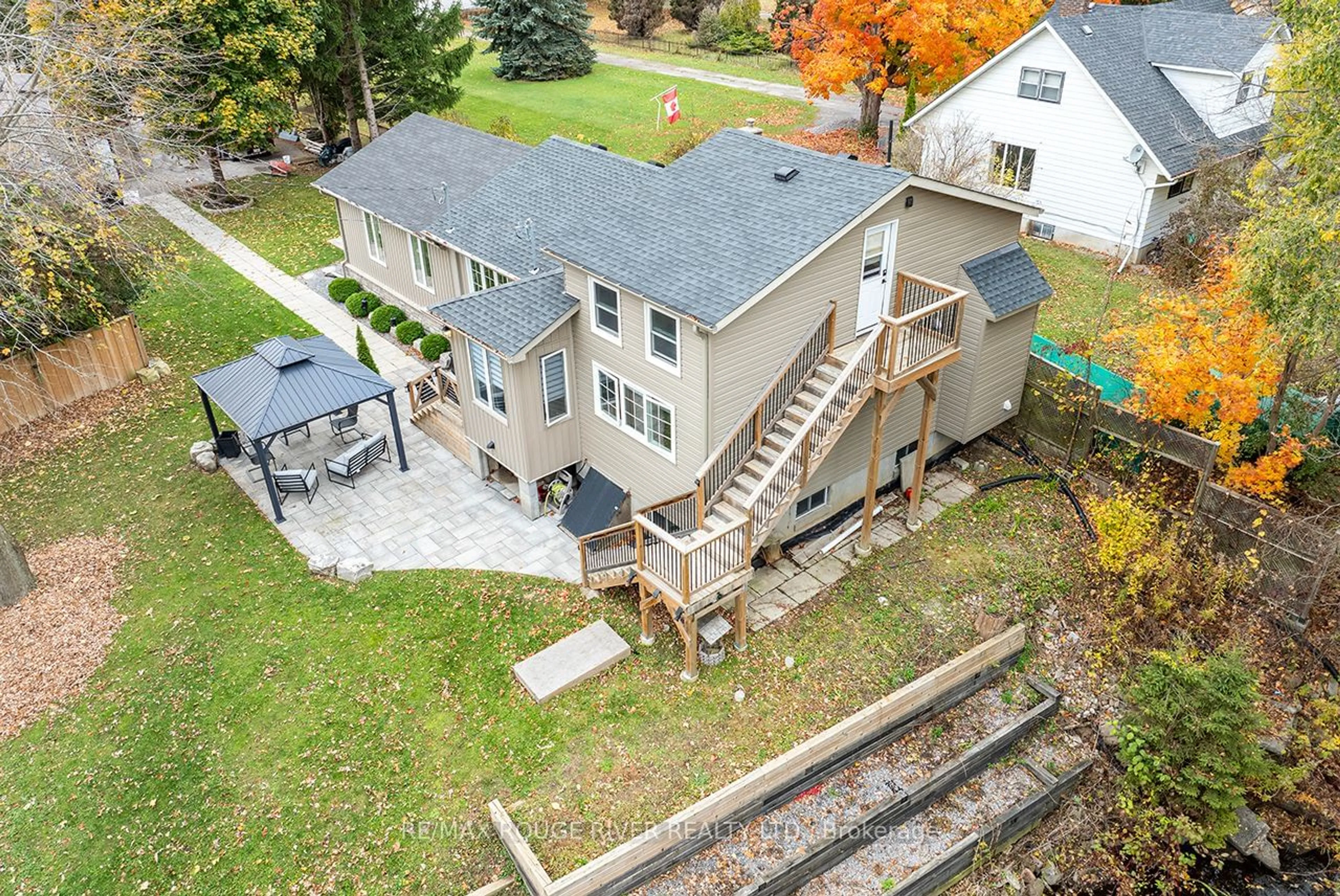 Frontside or backside of a home, the fenced backyard for 61 Townline Rd, Clarington Ontario L1E 2J3