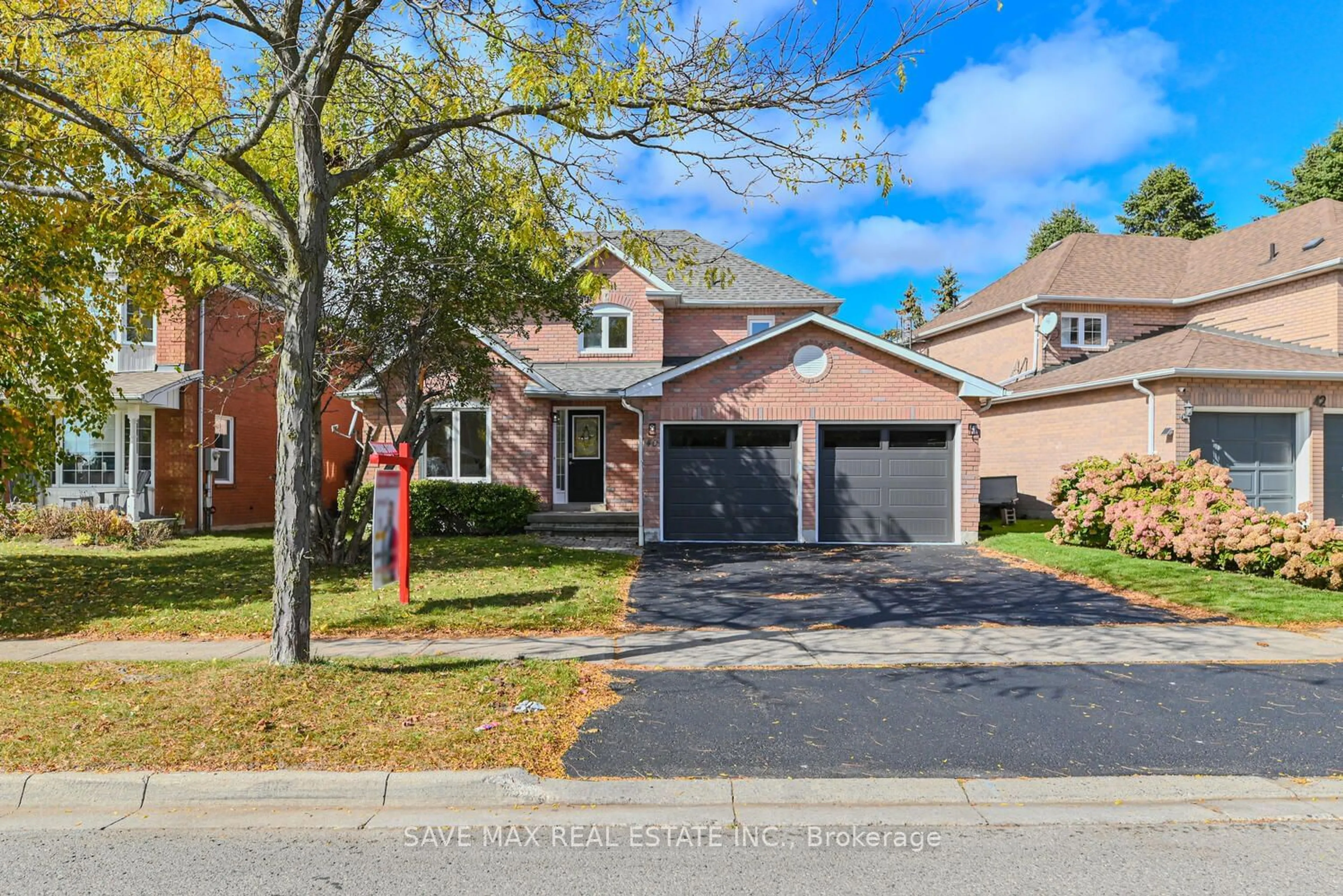 Home with brick exterior material for 40 Eric Clarke Dr, Whitby Ontario L1R 2H7