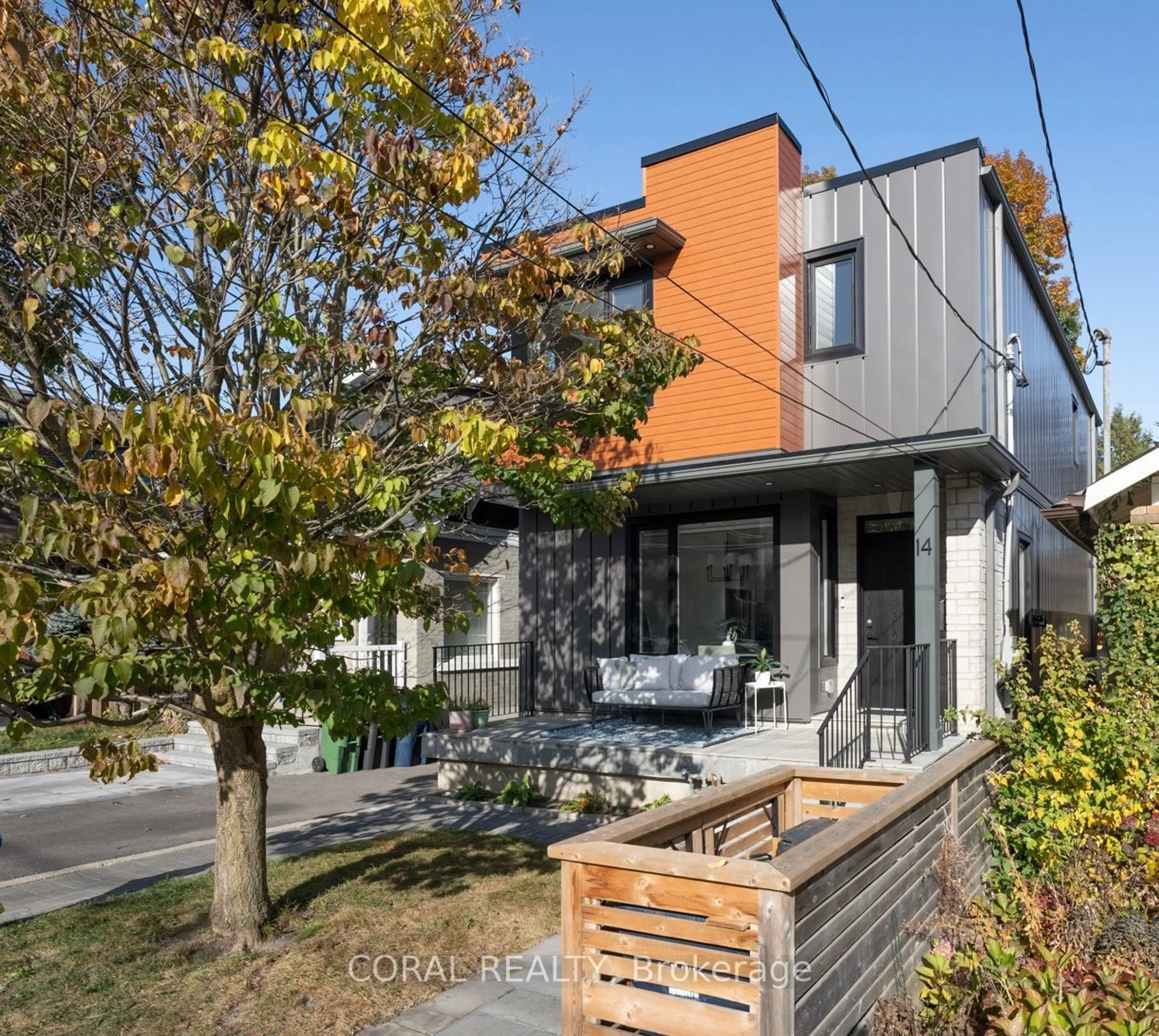 Frontside or backside of a home, the fenced backyard for 14 Westbrook Ave, Toronto Ontario M4C 2G2