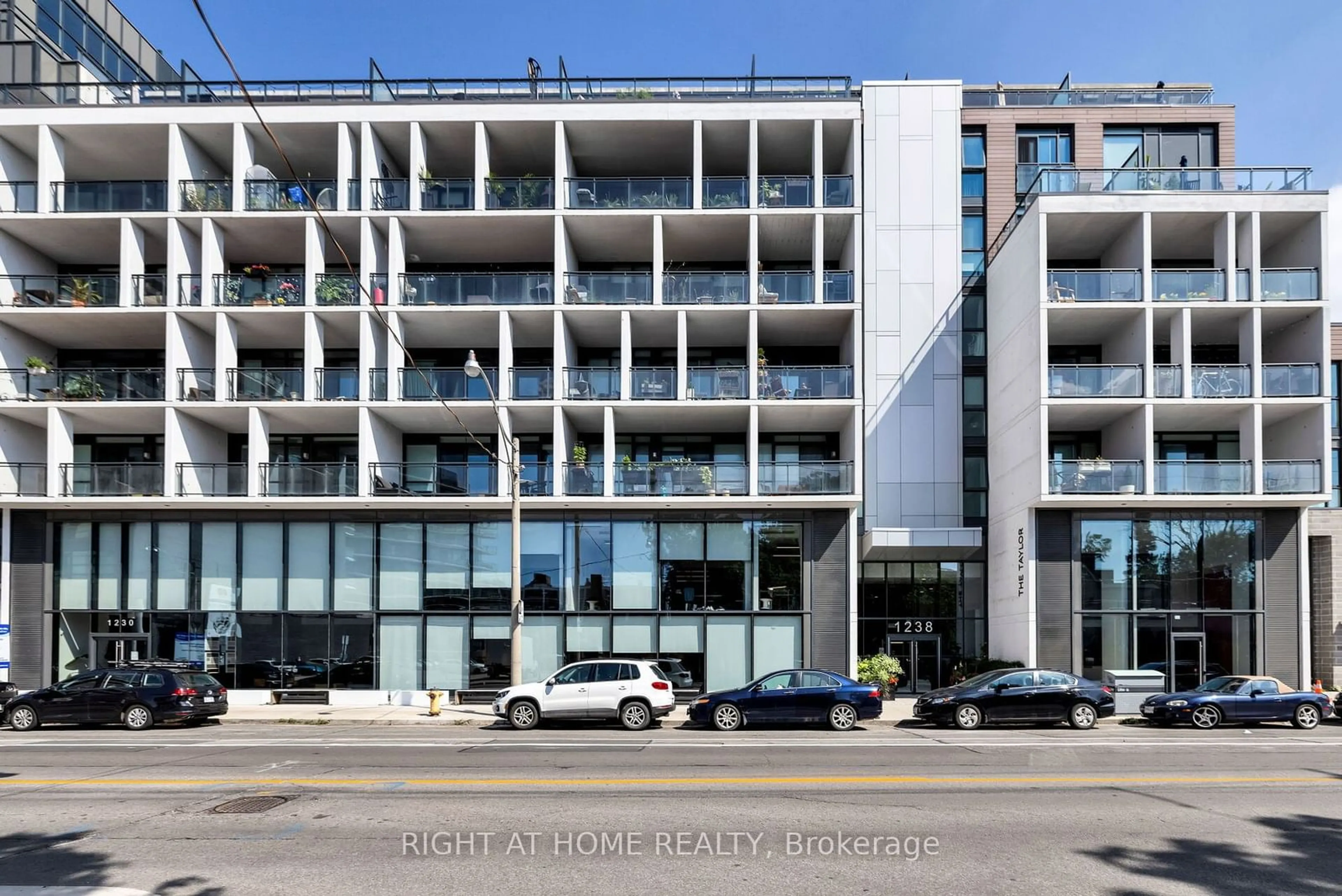 A pic from exterior of the house or condo, the front or back of building for 1238 Dundas St #306, Toronto Ontario M4M 2T1