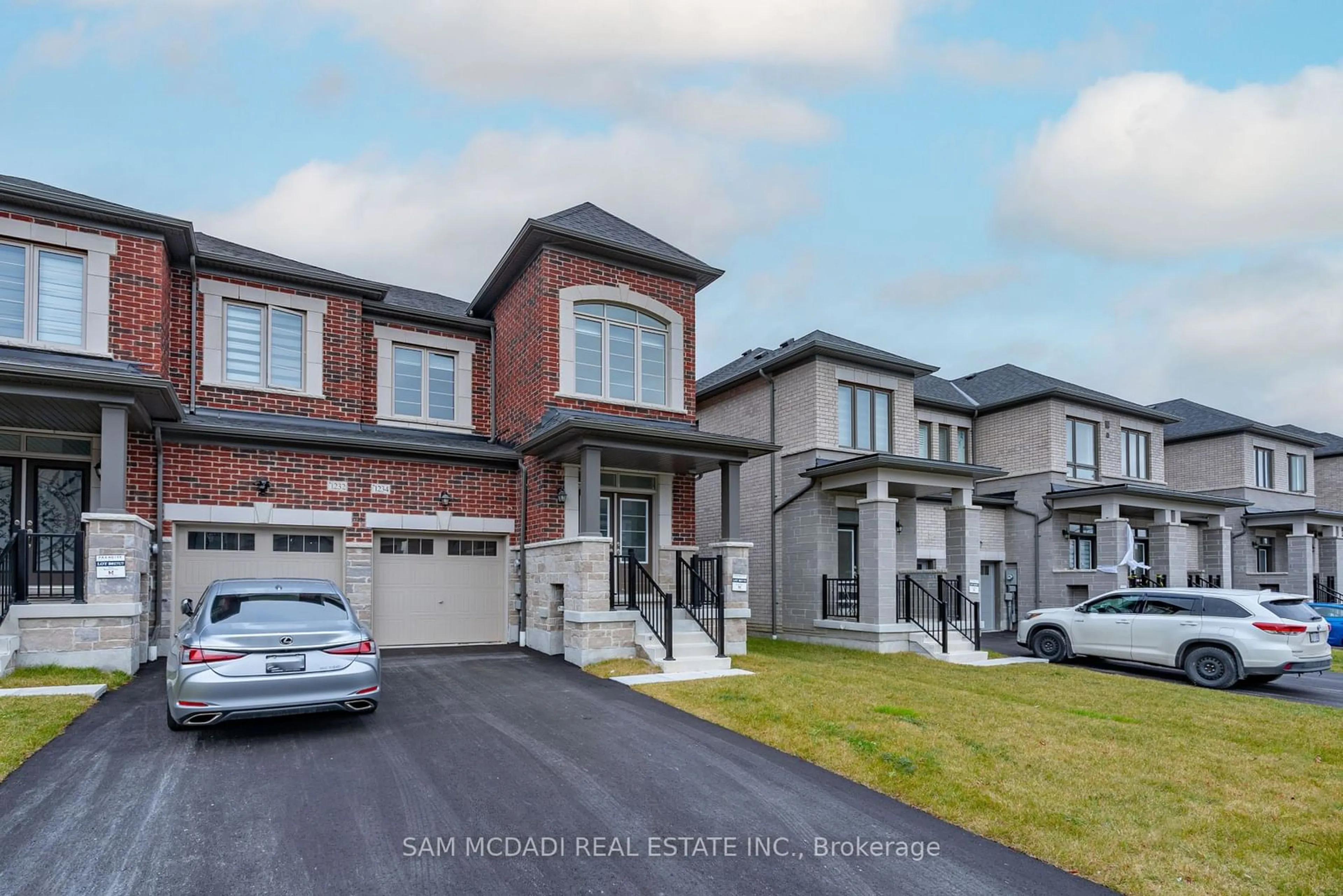 Frontside or backside of a home, the street view for 1234 Rexton Dr, Oshawa Ontario L1H 8L7