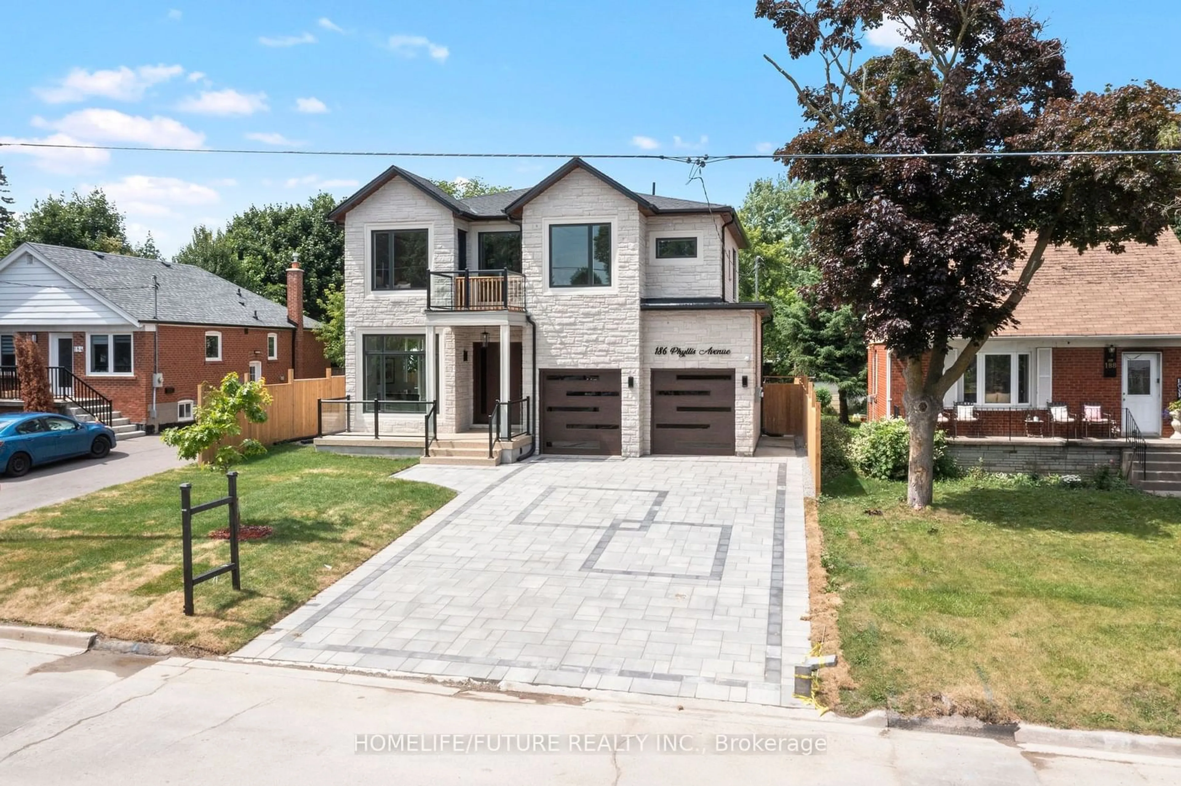 Frontside or backside of a home, the street view for 186 Phyllis Ave, Toronto Ontario M1M 1Y8