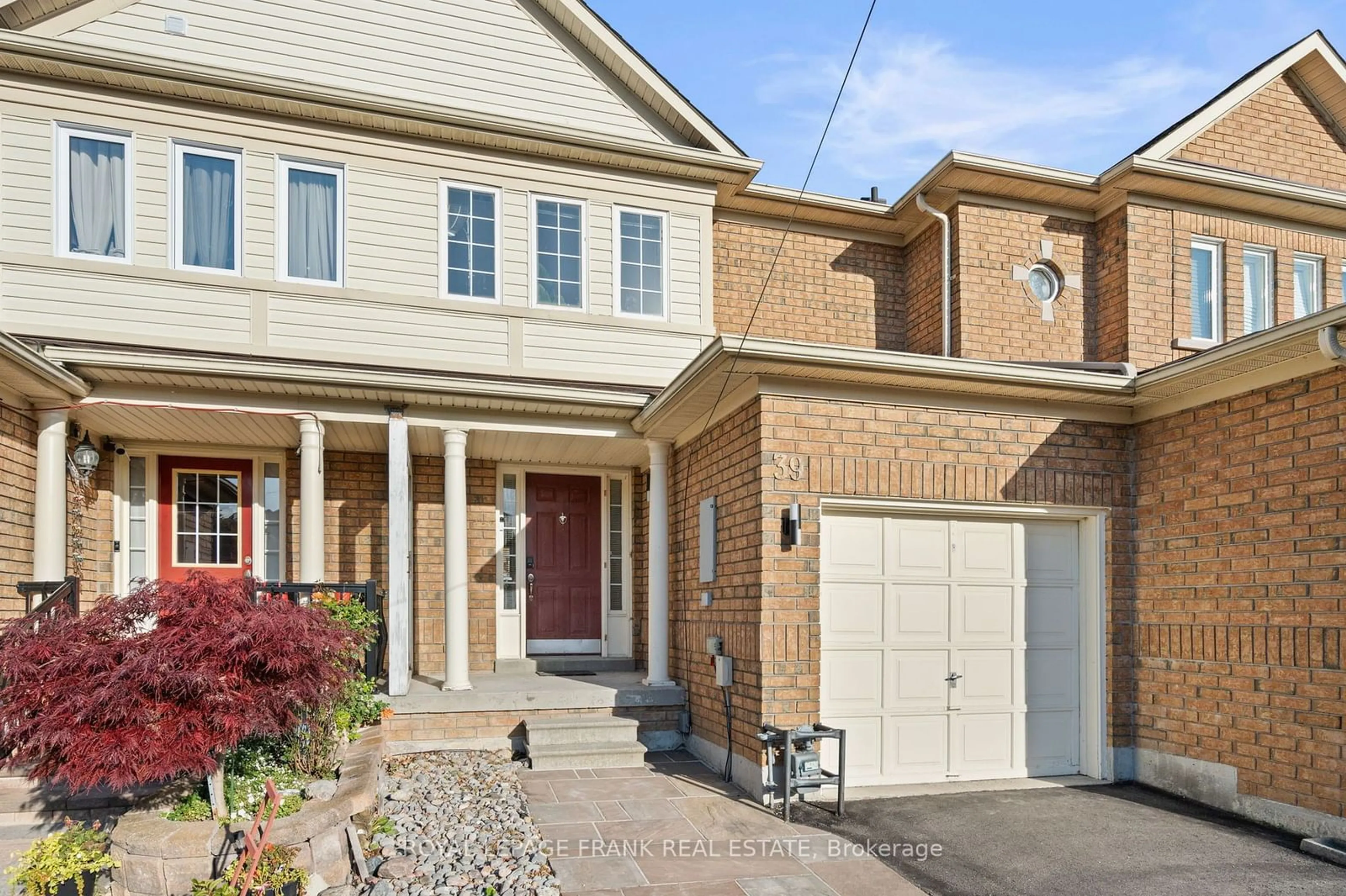 Home with brick exterior material for 39 Eastport Dr, Toronto Ontario M1C 5C4