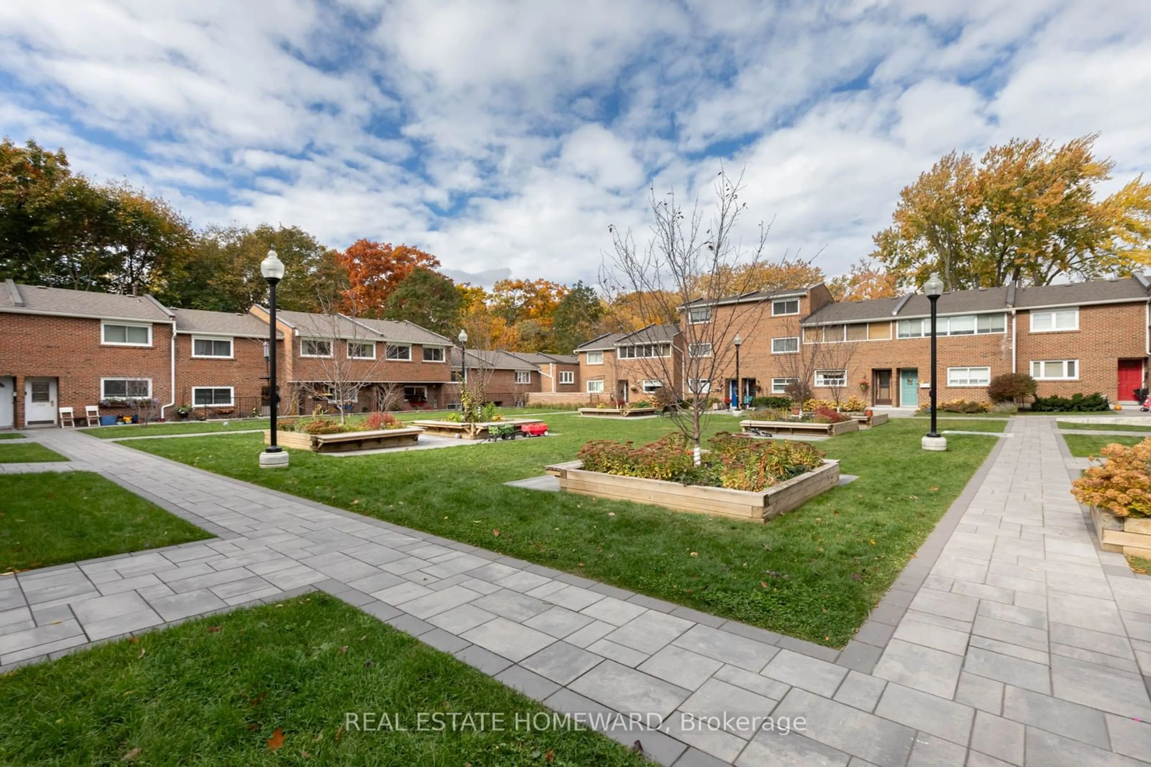 Patio, the fenced backyard for 90 Edgewood Ave #118, Toronto Ontario M4L 3H1