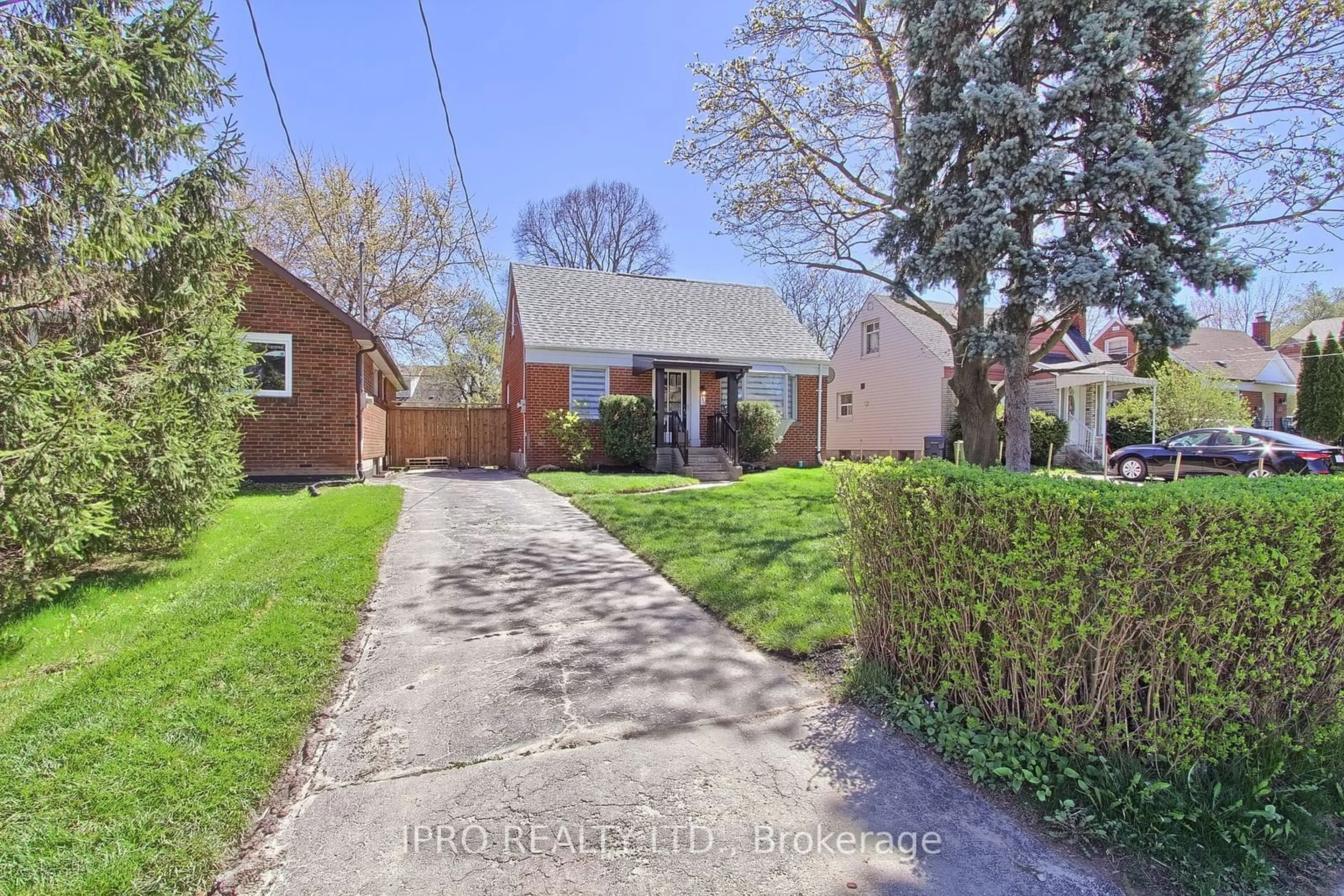 Frontside or backside of a home, the street view for 165 Ellesmere Rd, Toronto Ontario M1R 4C7