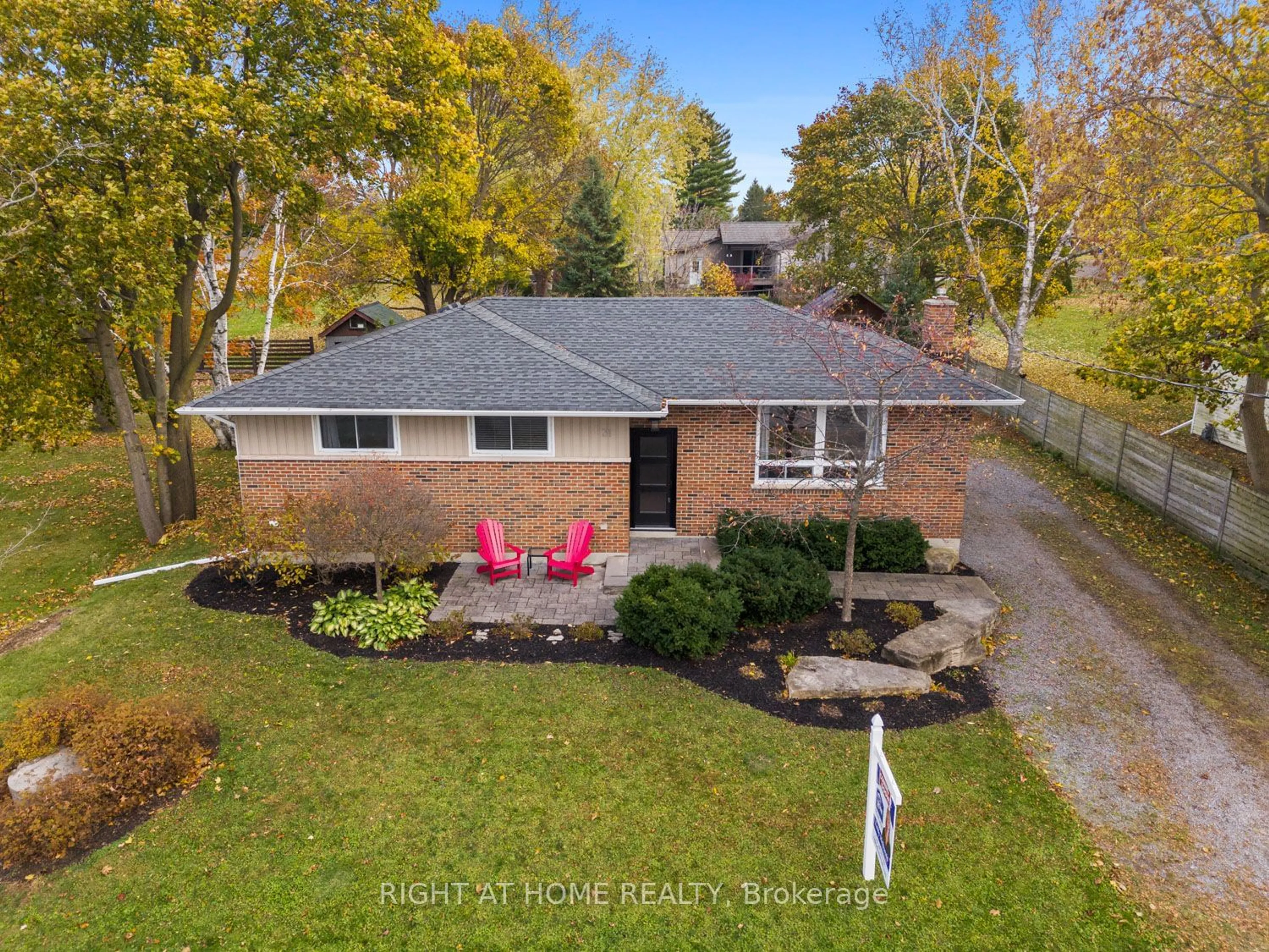 Frontside or backside of a home, the fenced backyard for 31 Jeffrey St, Scugog Ontario L9L 1C2