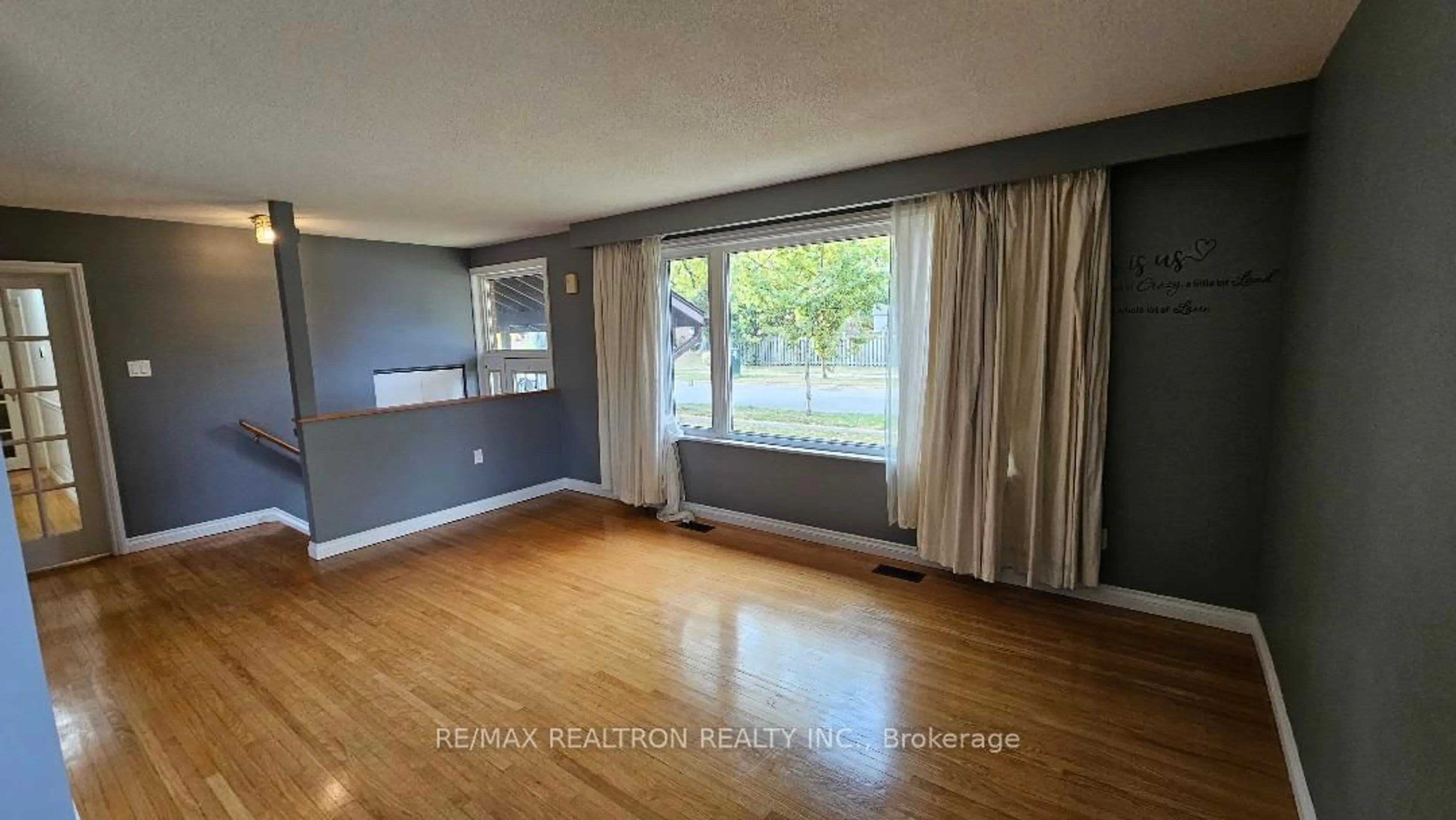 A pic of a room, wood floors for 41 Dearham Wood, Toronto Ontario M1E 1S2