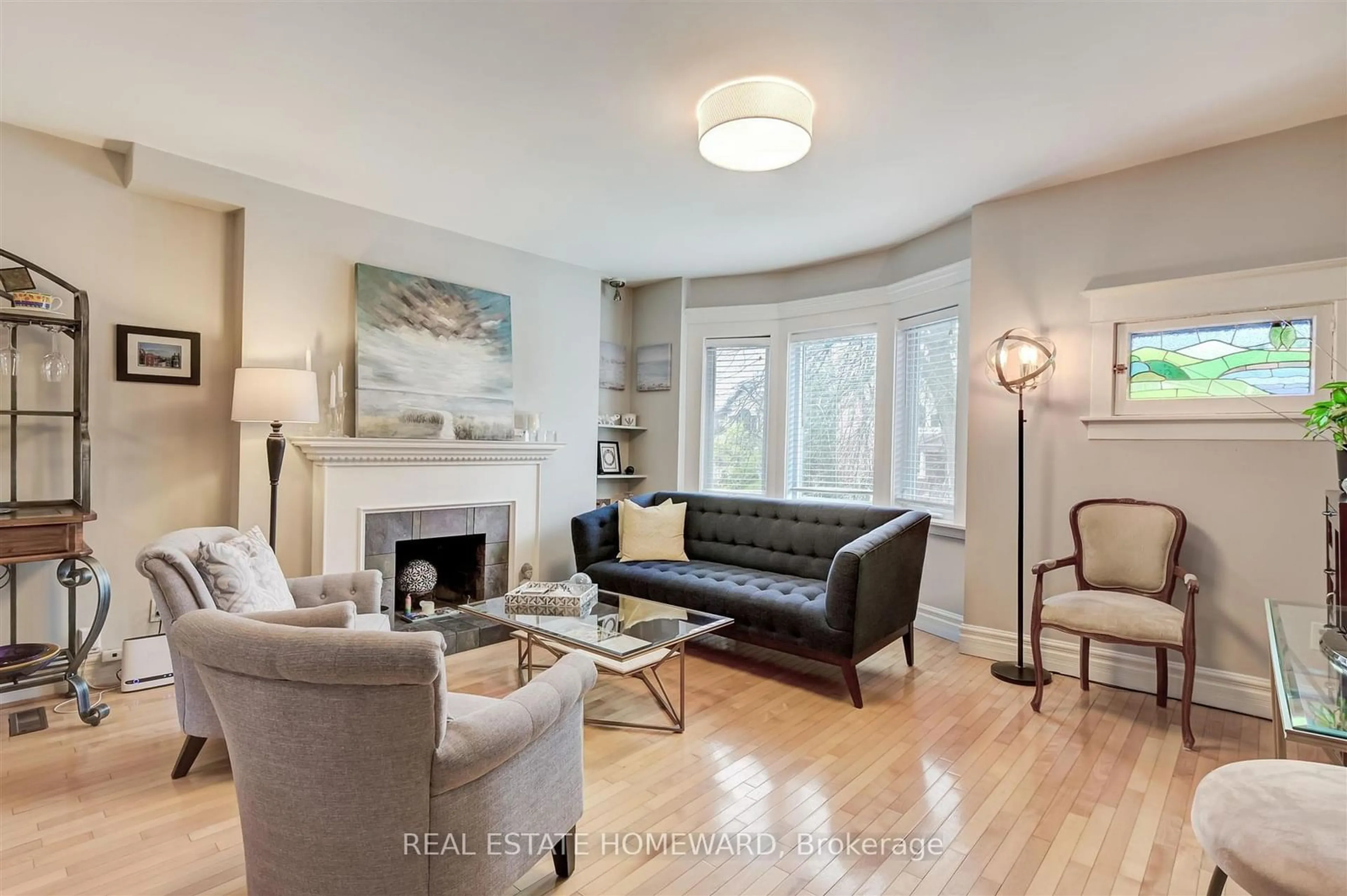 Living room, wood floors for 167 Wineva Ave, Toronto Ontario M4E 2T5