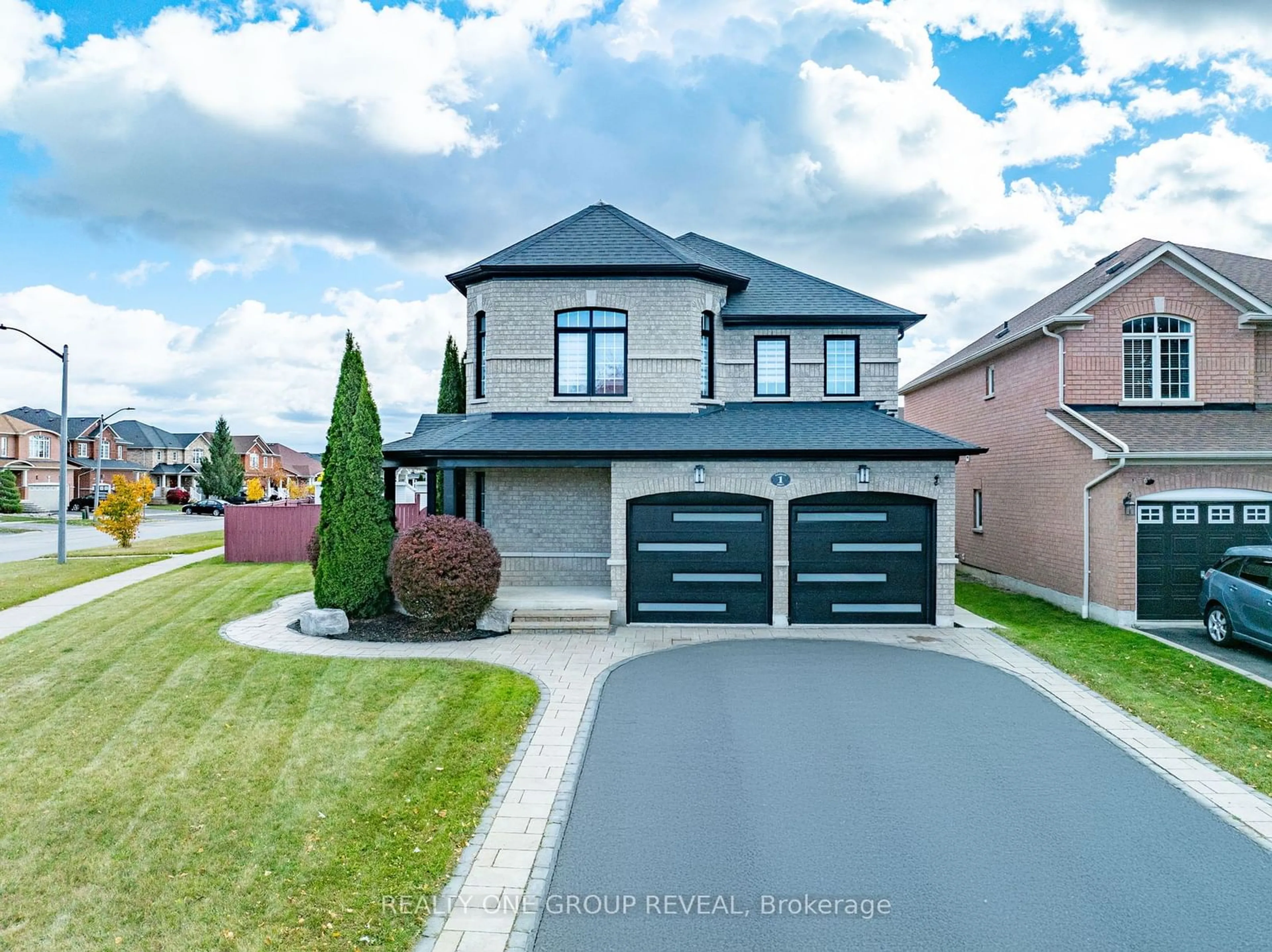 Frontside or backside of a home, the street view for 1 Bridgid Dr, Whitby Ontario L1P 1T7