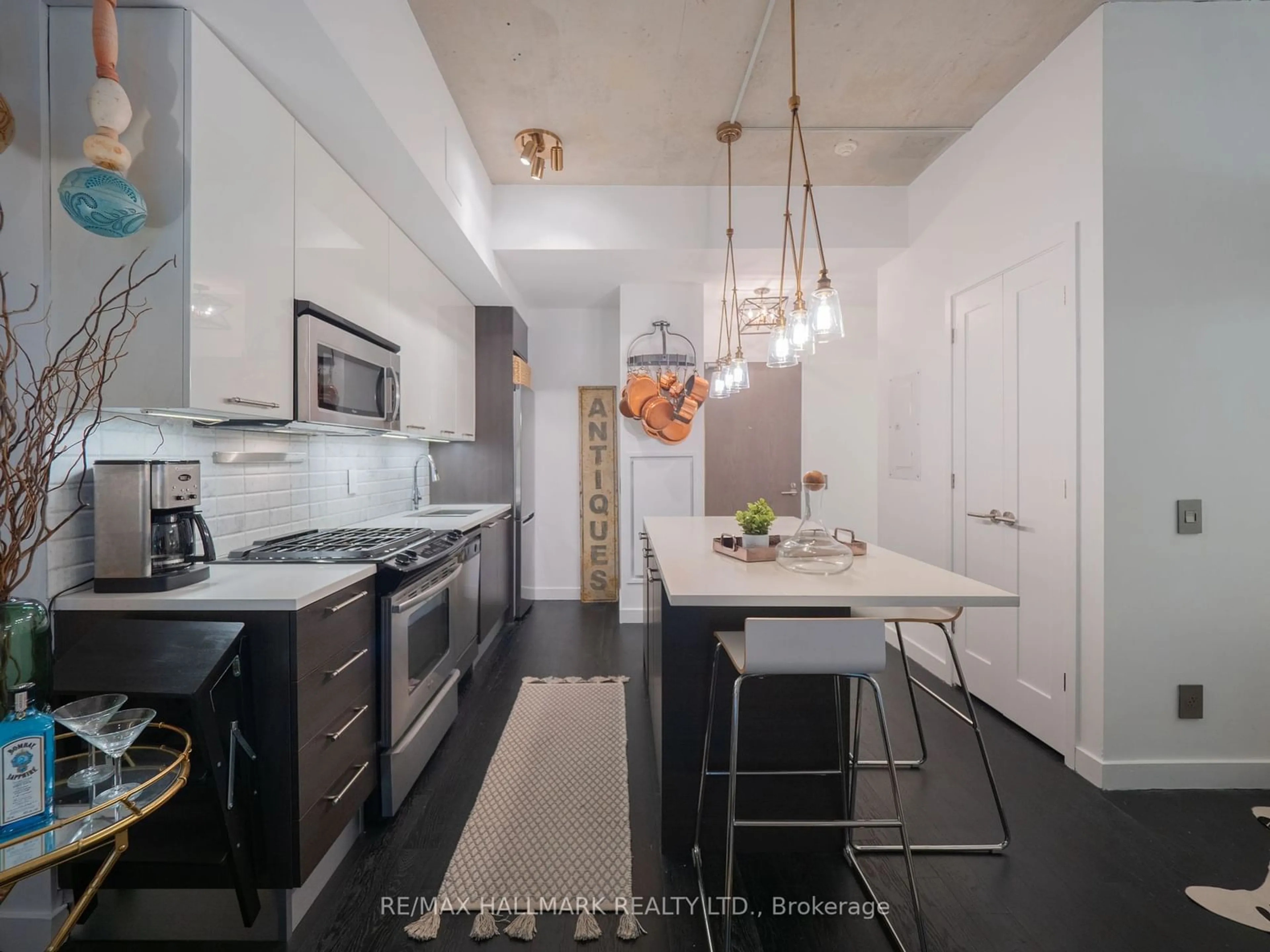 Contemporary kitchen, wood floors for 90 Broadview Ave #526, Toronto Ontario M4M 0A7