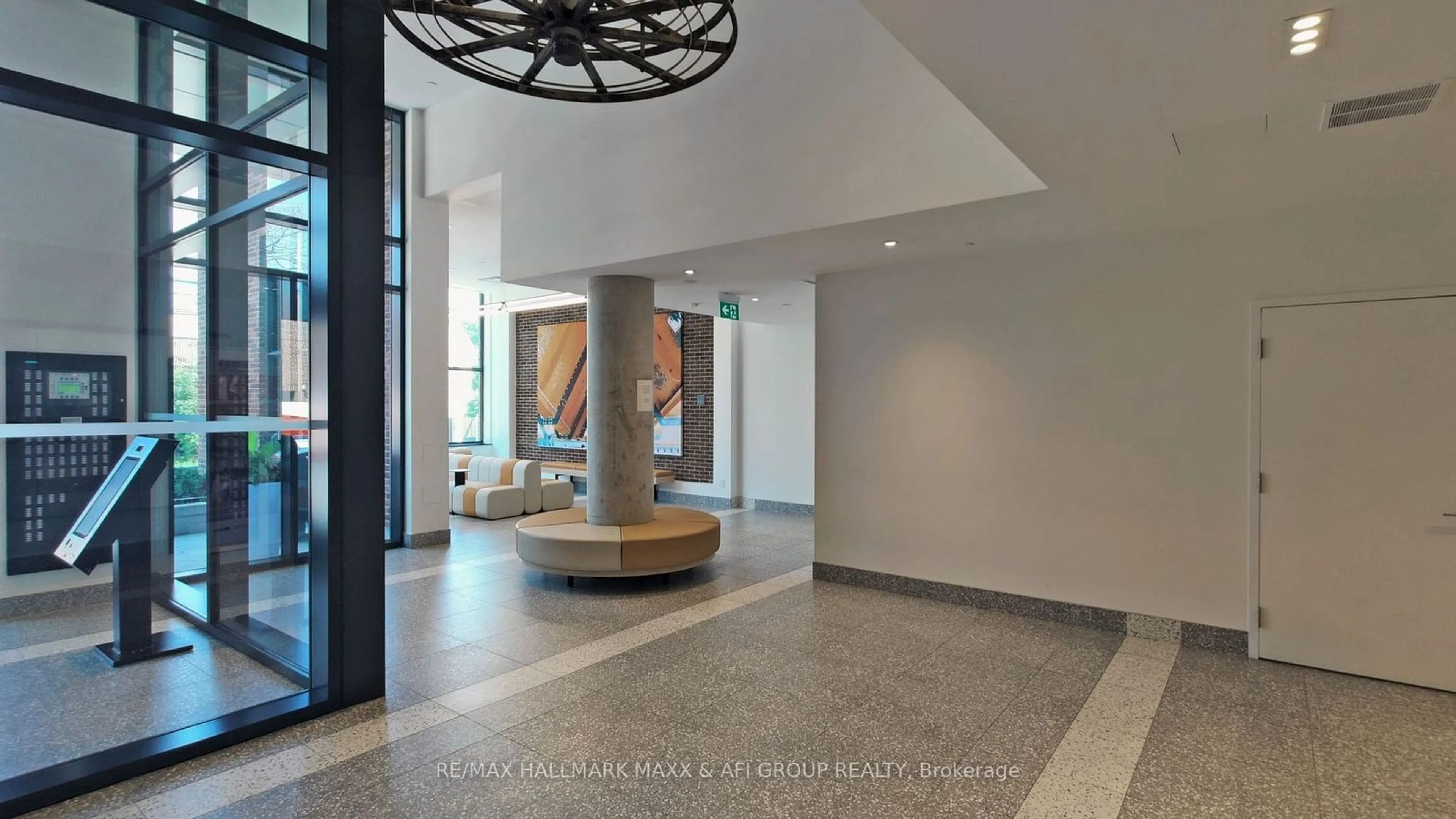 Indoor lobby, cement floor for 150 Logan Ave #431, Toronto Ontario M4M 0E4