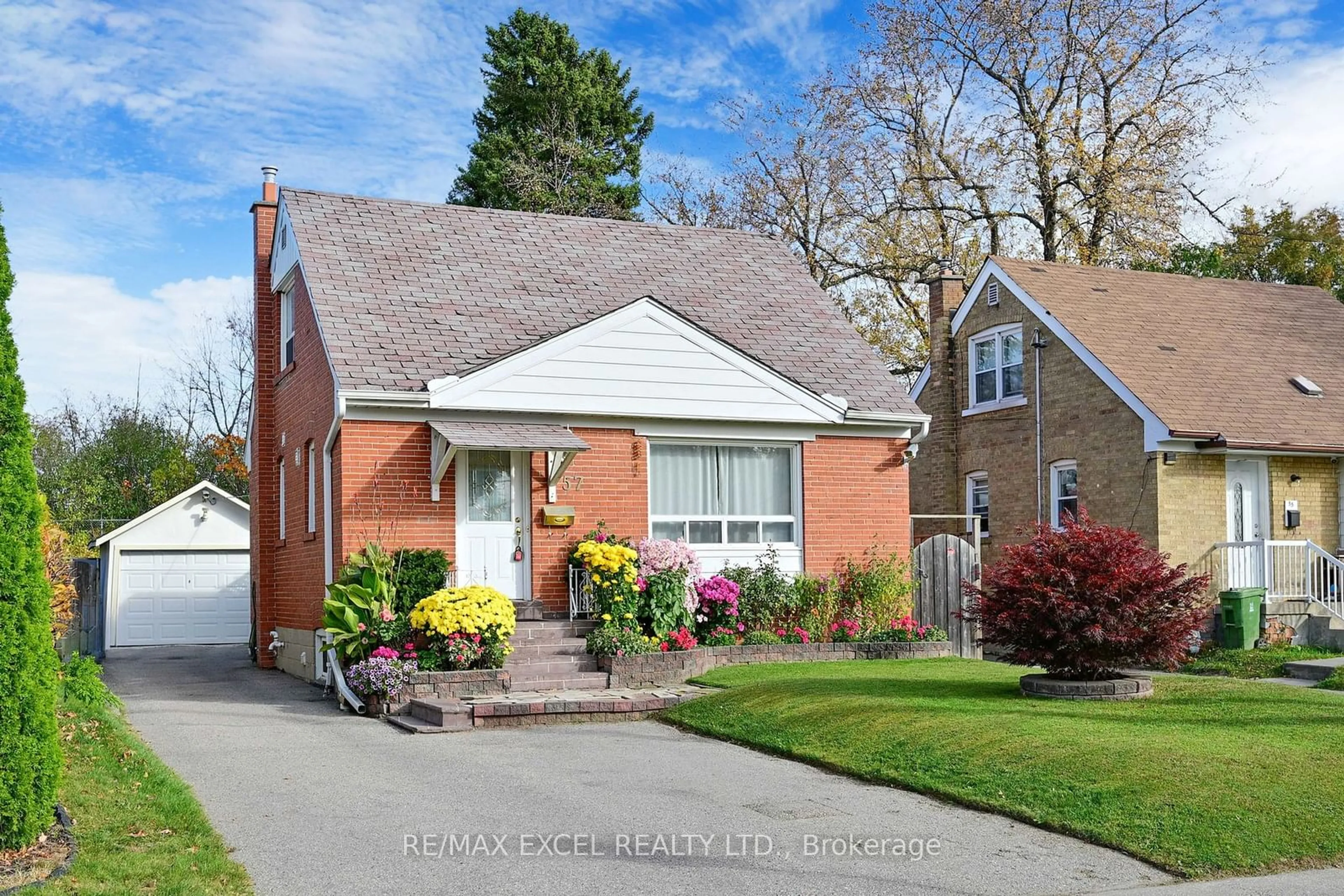 Frontside or backside of a home, cottage for 57 Ellington Dr, Toronto Ontario M1R 3X6