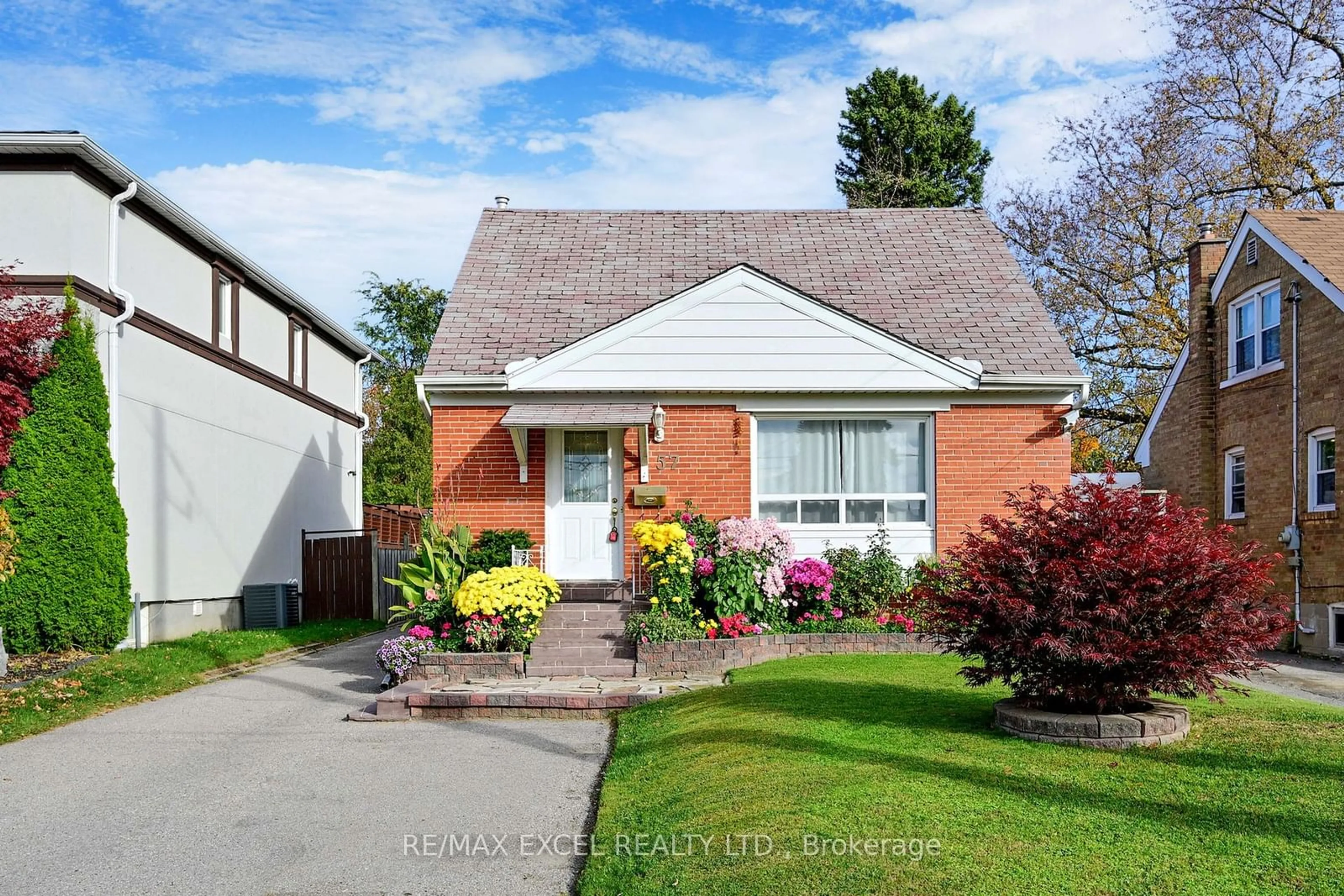 Frontside or backside of a home, cottage for 57 Ellington Dr, Toronto Ontario M1R 3X6