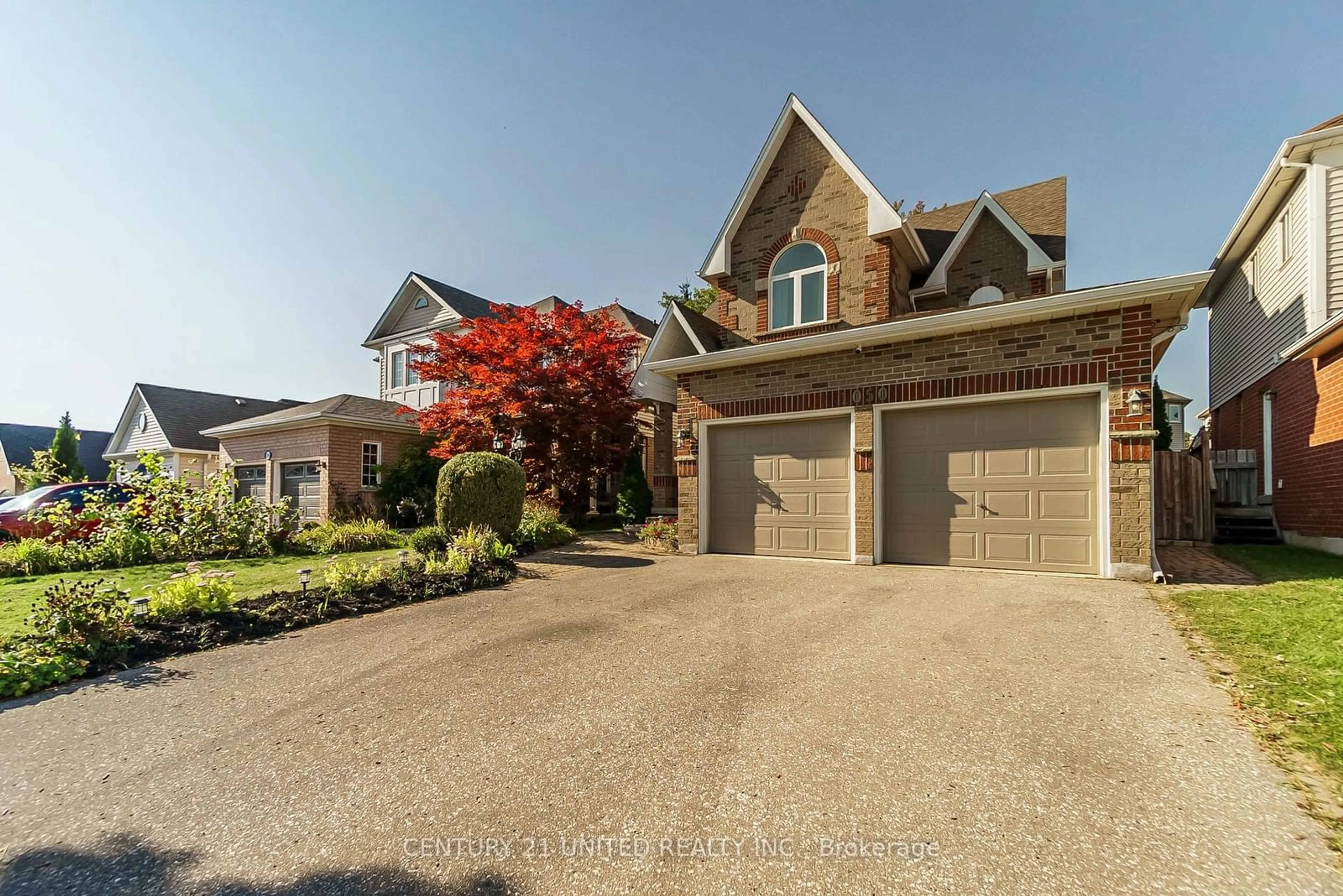 Frontside or backside of a home, the street view for 1050 Beatrice St, Oshawa Ontario L1K 2K5