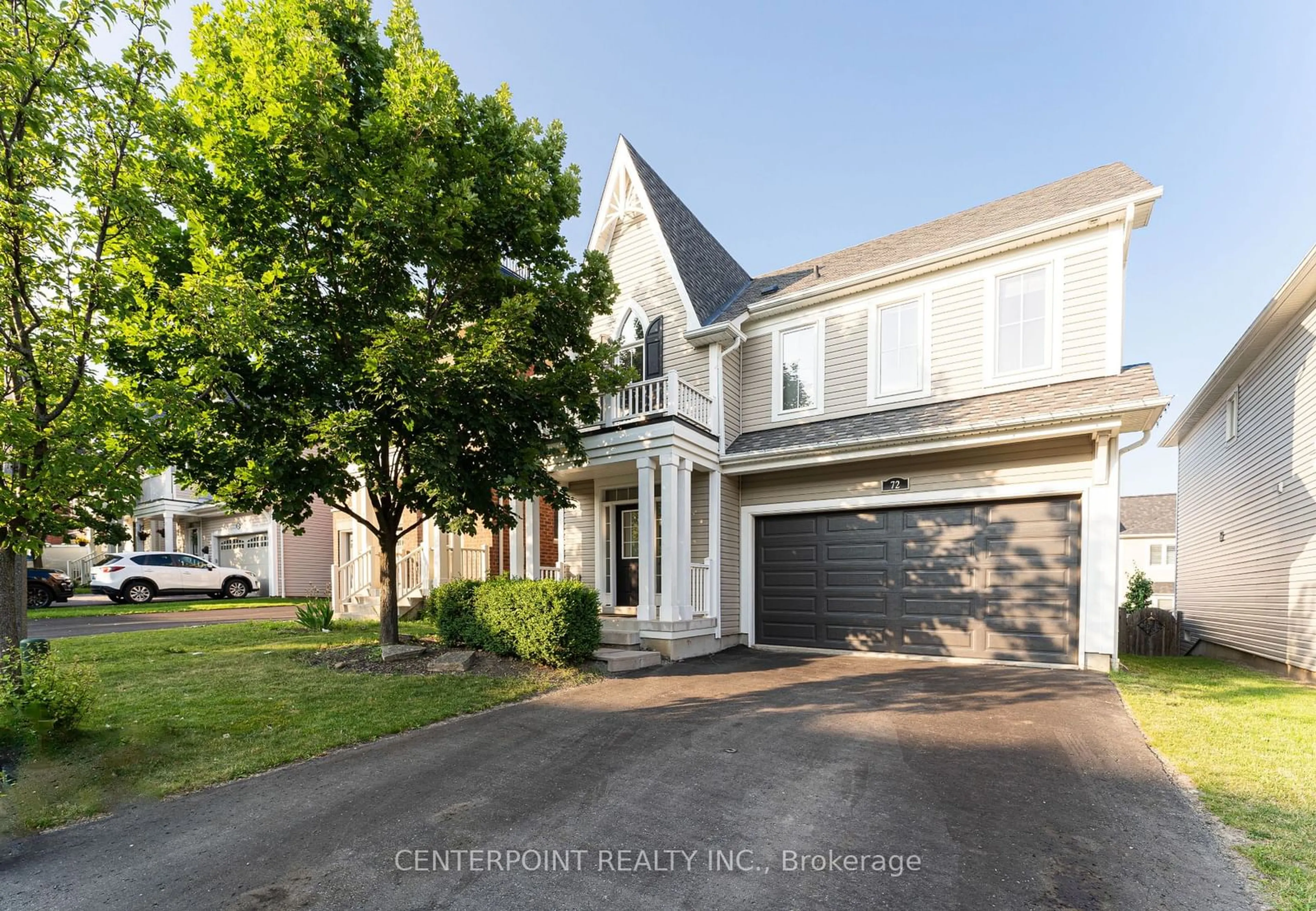 Frontside or backside of a home, the street view for 72 Strandmore Circ, Whitby Ontario L1M 0B9