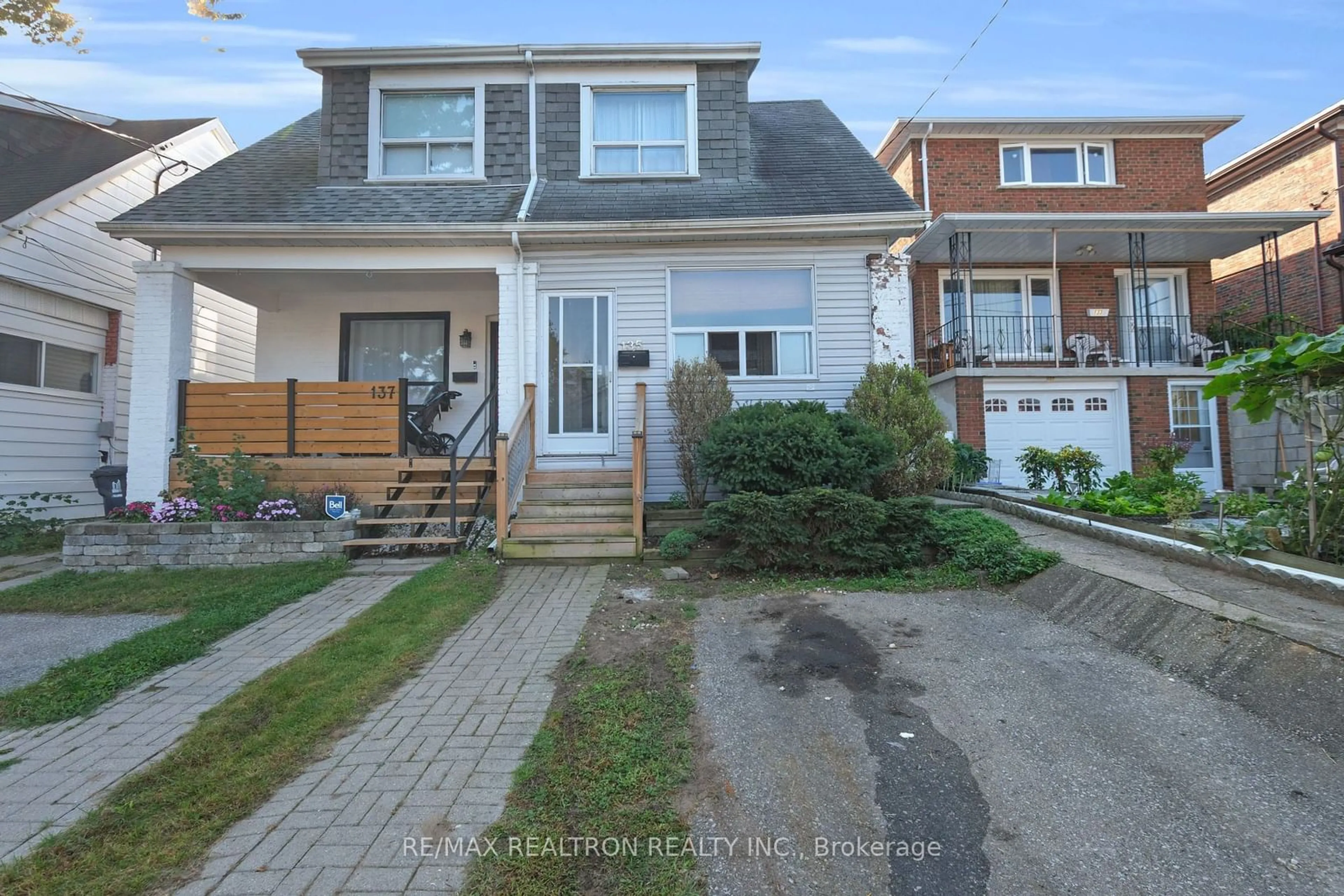 Frontside or backside of a home, the street view for 135 Holborne Ave, Toronto Ontario M4C 2R5