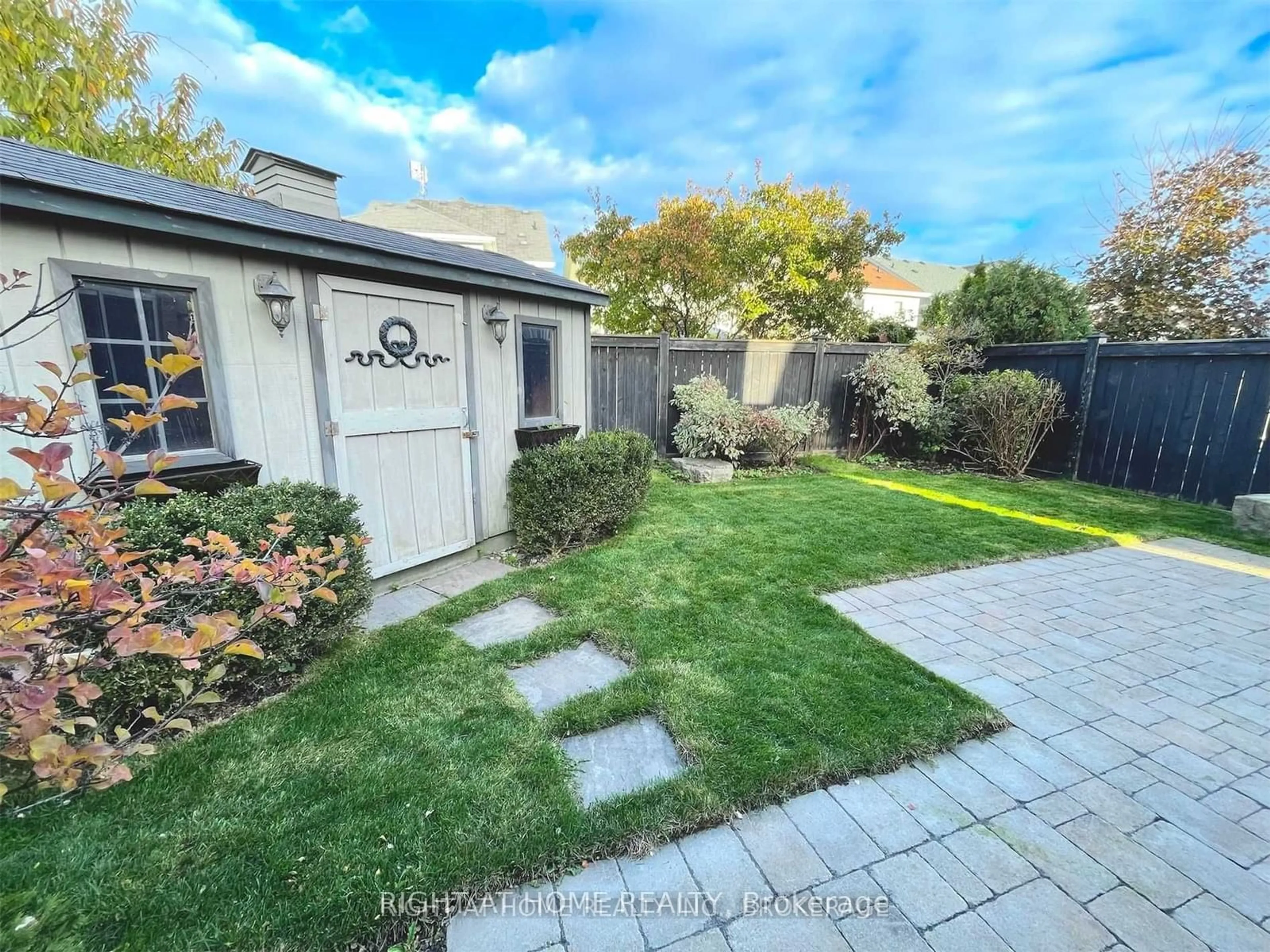 Frontside or backside of a home, the fenced backyard for 181 Cachet Blvd, Whitby Ontario L1M 2L9