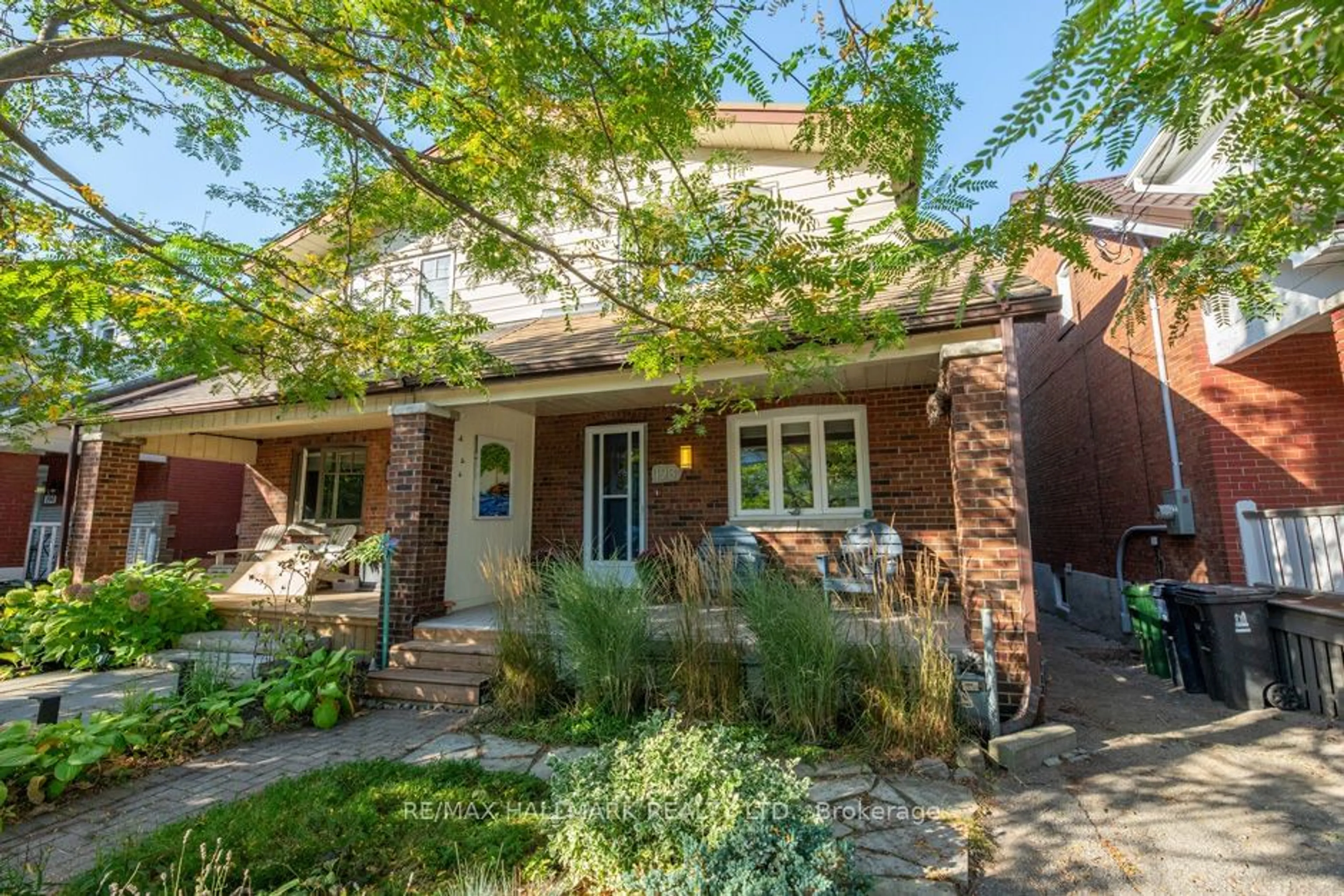 Home with brick exterior material for 198 Lawlor Ave, Toronto Ontario M4E 3M1