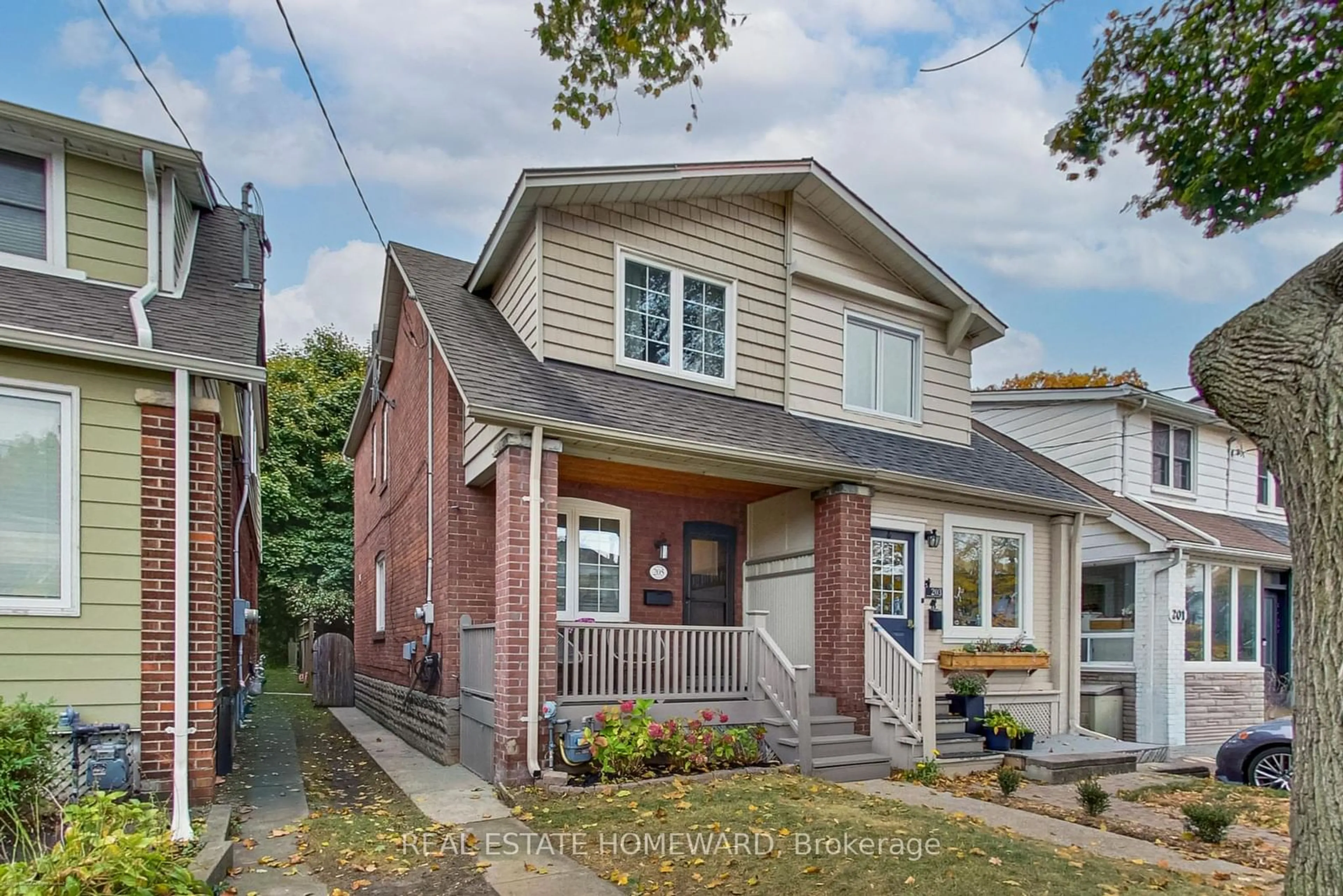 Frontside or backside of a home, cottage for 205 Lawlor Ave, Toronto Ontario M4E 3L9