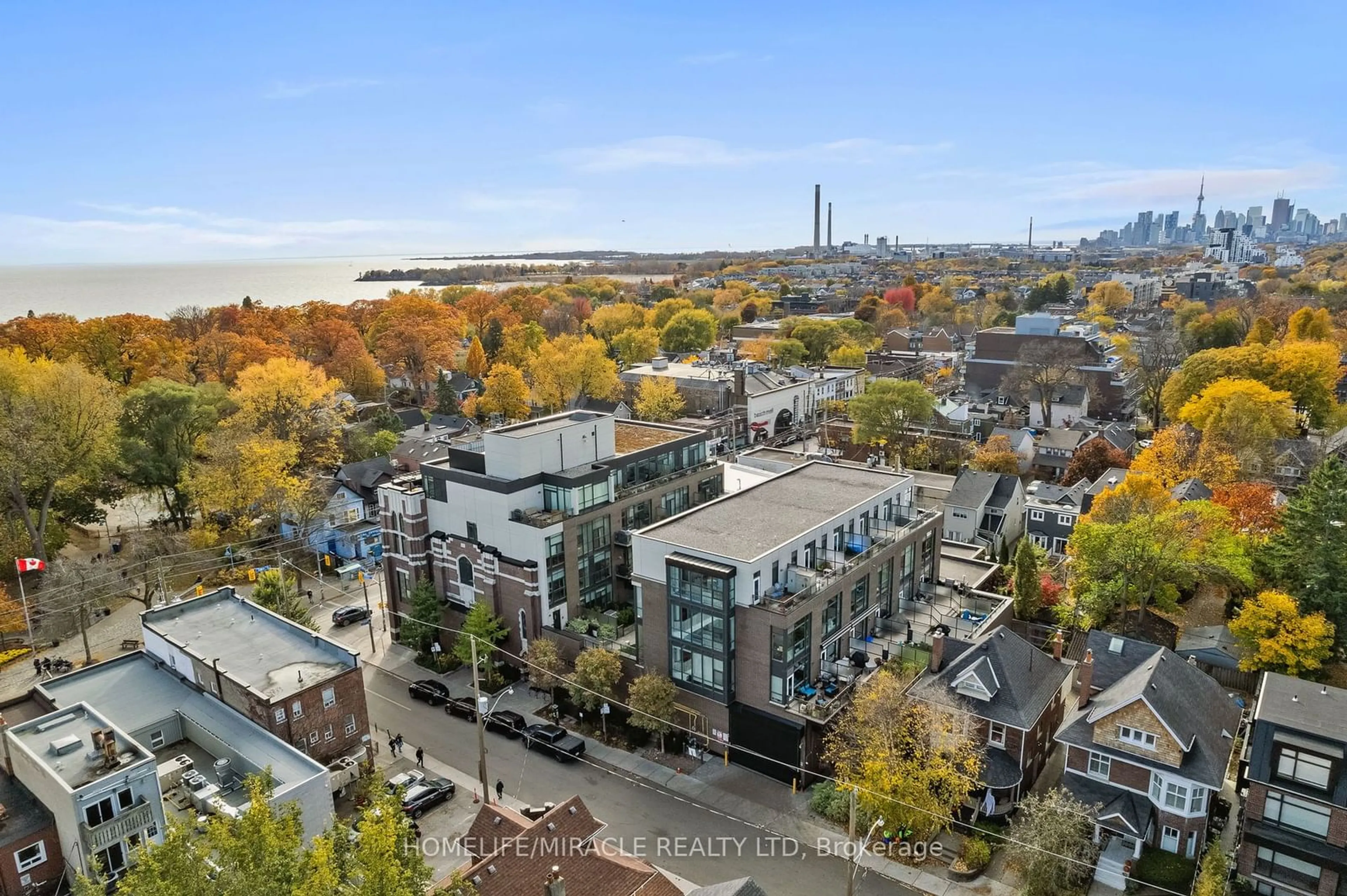 A pic from exterior of the house or condo, the view of city buildings for 2 Bellefair Ave #306, Toronto Ontario M4L 3T8