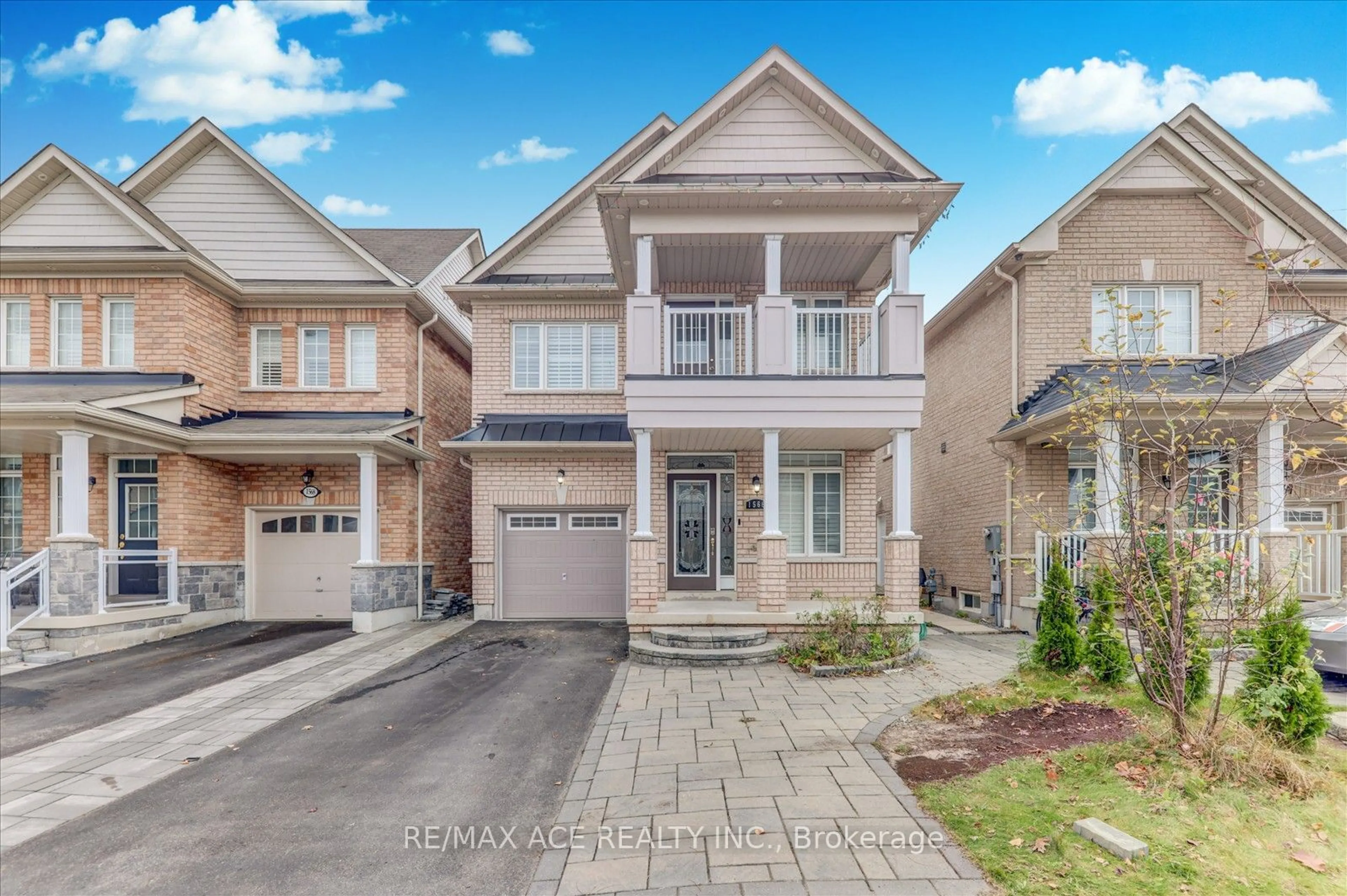 Frontside or backside of a home, the street view for 1566 Dusty Dr, Pickering Ontario L1X 2R2