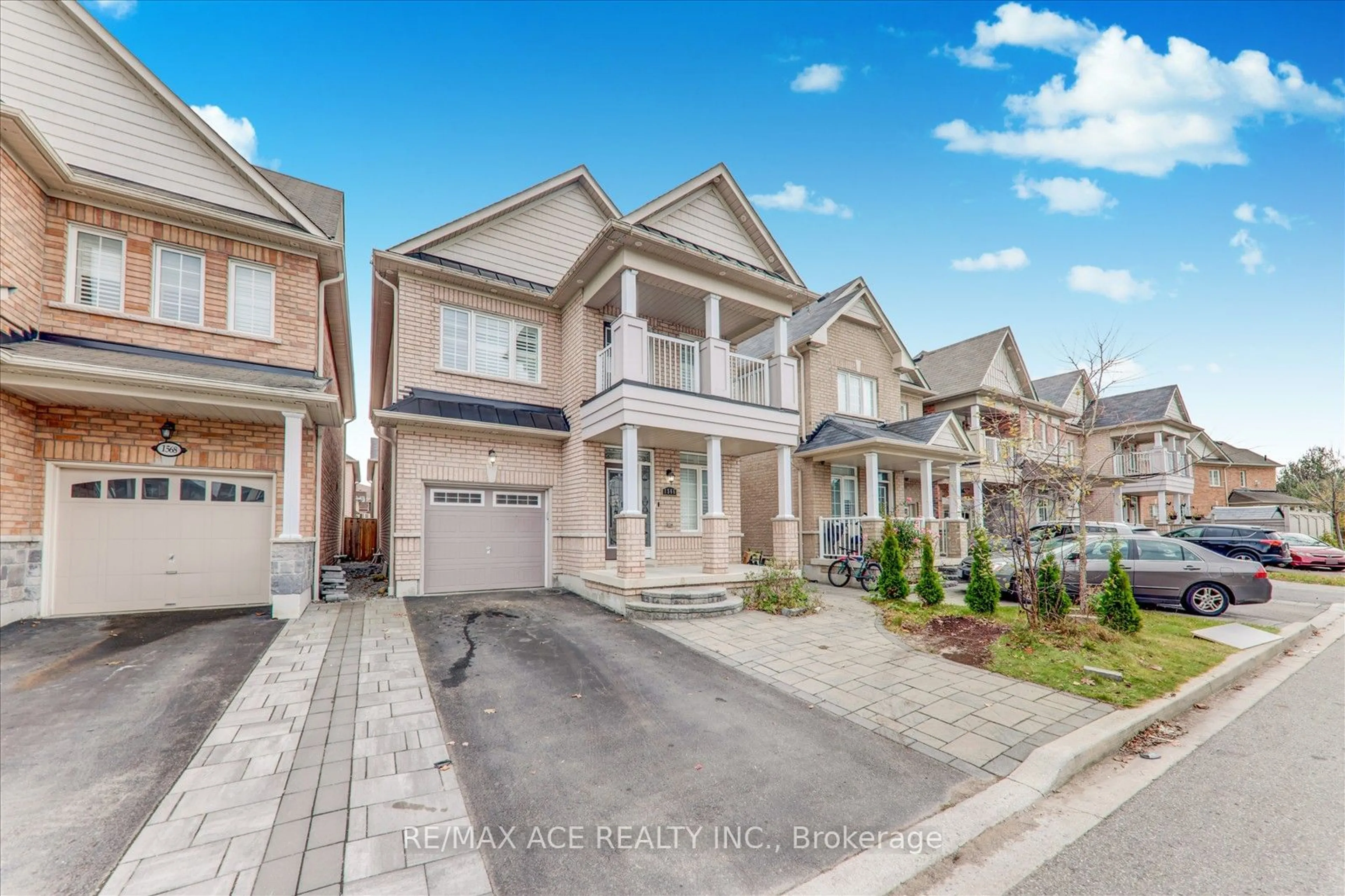 Frontside or backside of a home, the street view for 1566 Dusty Dr, Pickering Ontario L1X 2R2